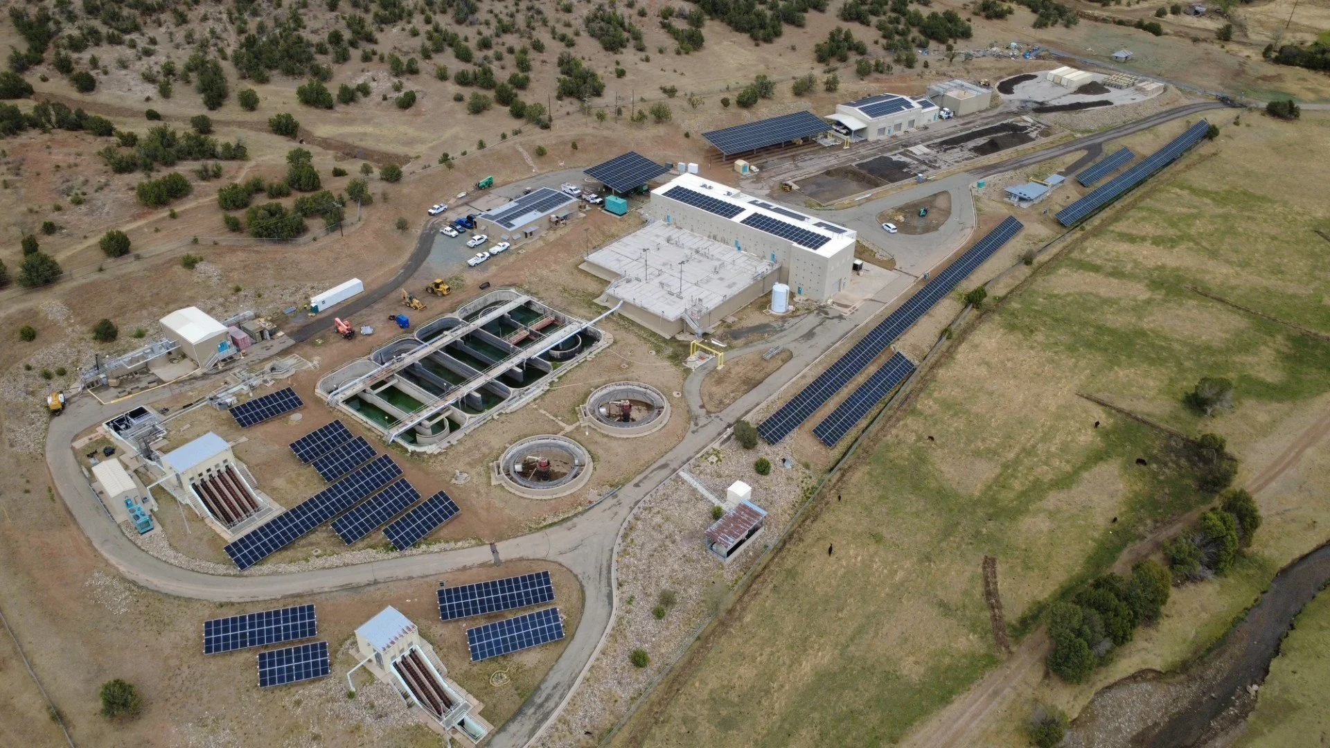 Aerial view of solar arrays installed throughout the Ruidoso/Ruidoso Downs Regional Wastewater Treatment Plant site.