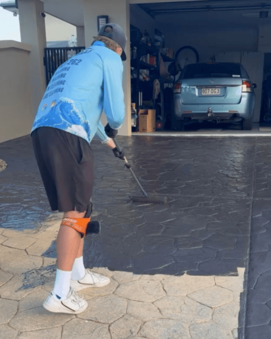 Concrete driveway clean and seal Gold Coast before and after