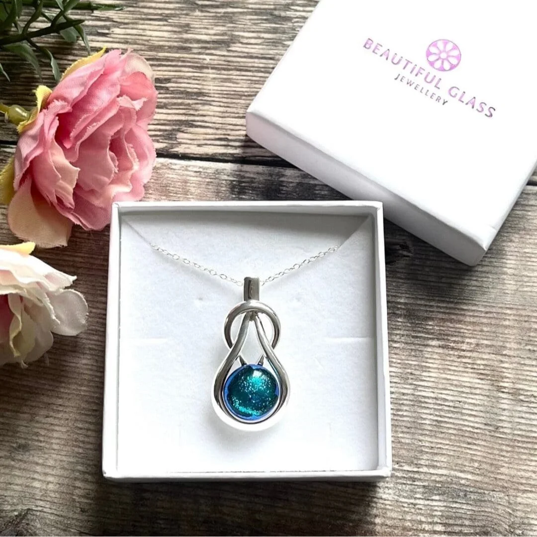 turquoise-dichroic-glass-celtic-knot-pendant.jpg