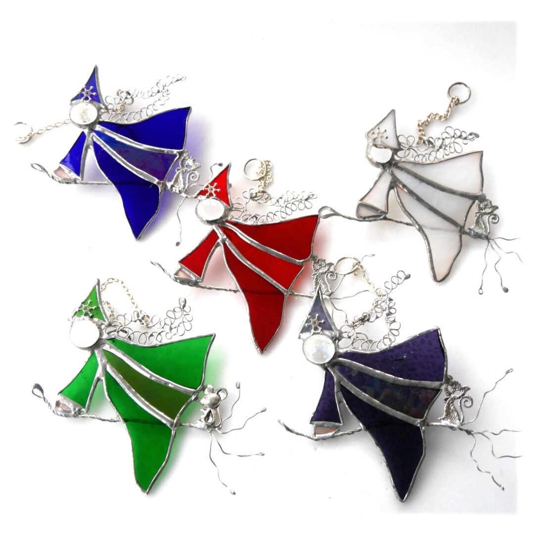 multicolour stained glass flying witches
