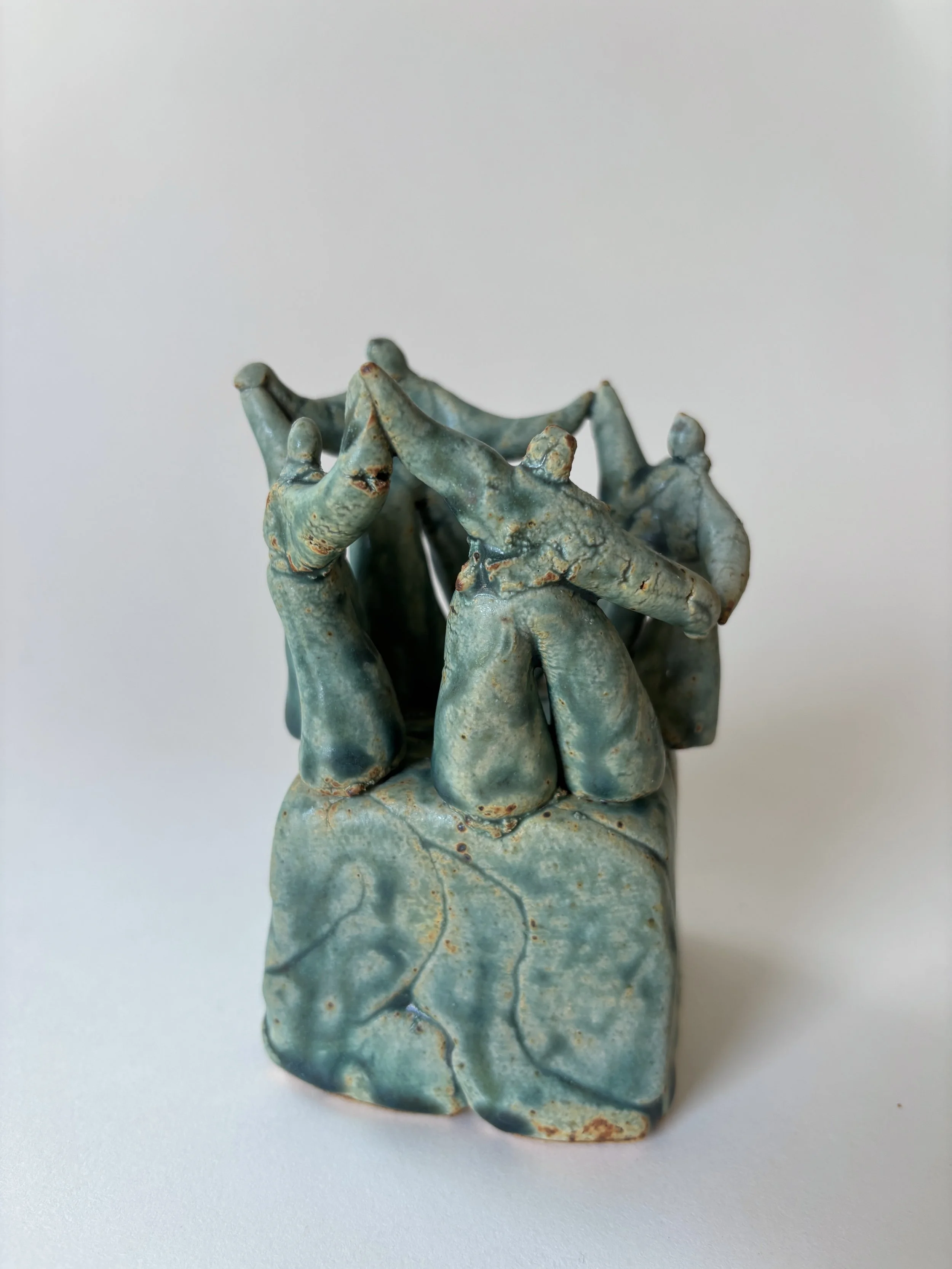 Group of Four Figurine