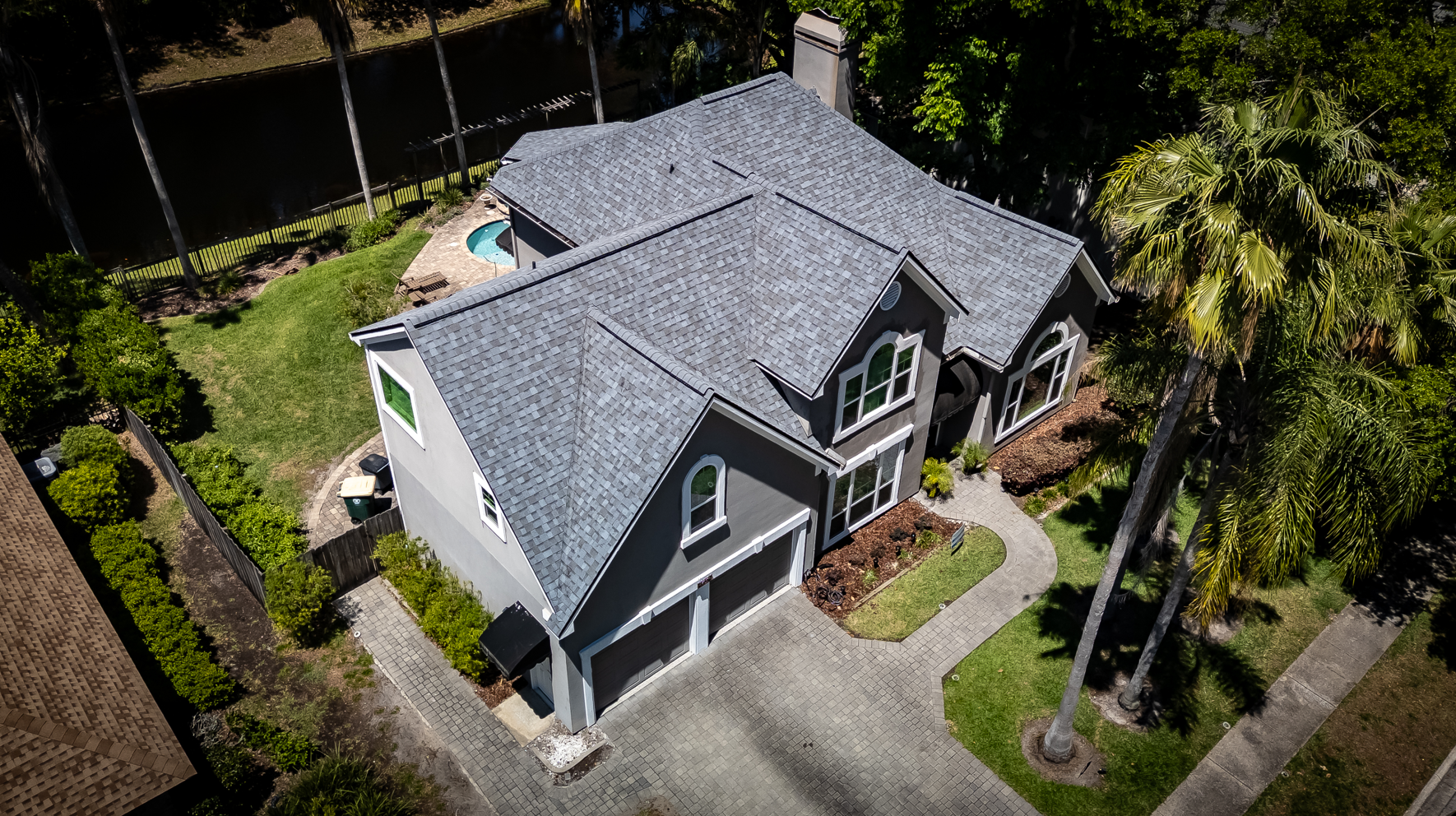 Architectural asphalt shingle roof installed on Jacksonville Florida home by NEXGEN Roofing