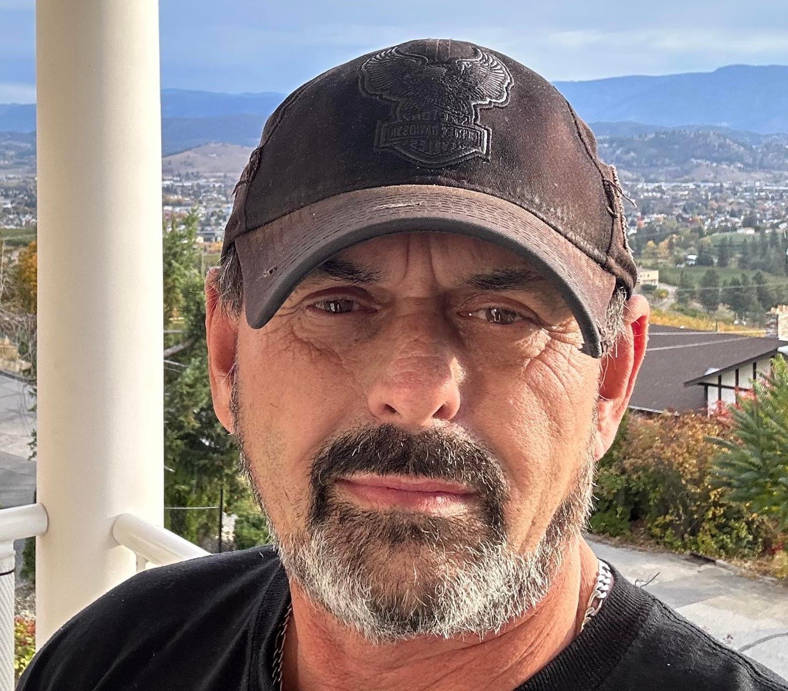 "Image of individual identified in documented disputes between clients and general contractors, referenced in public forums."