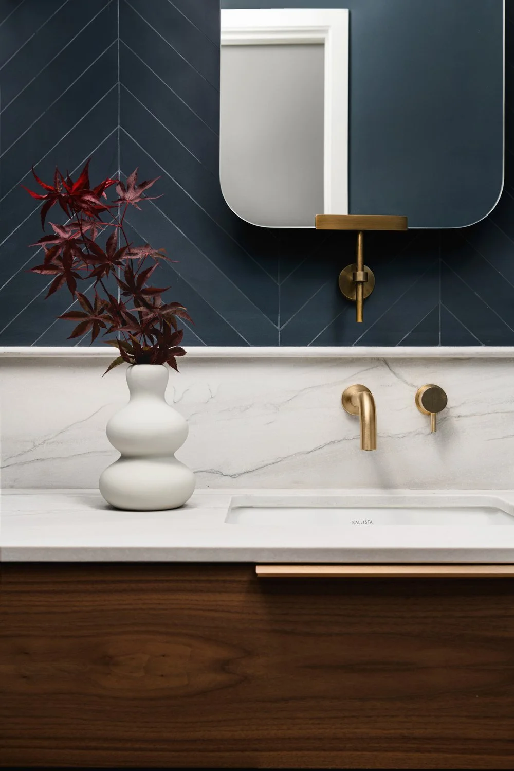 Bespoke bathroom cabinetry in a Custom Contemporary California home, blending earthy tones with bold design features.