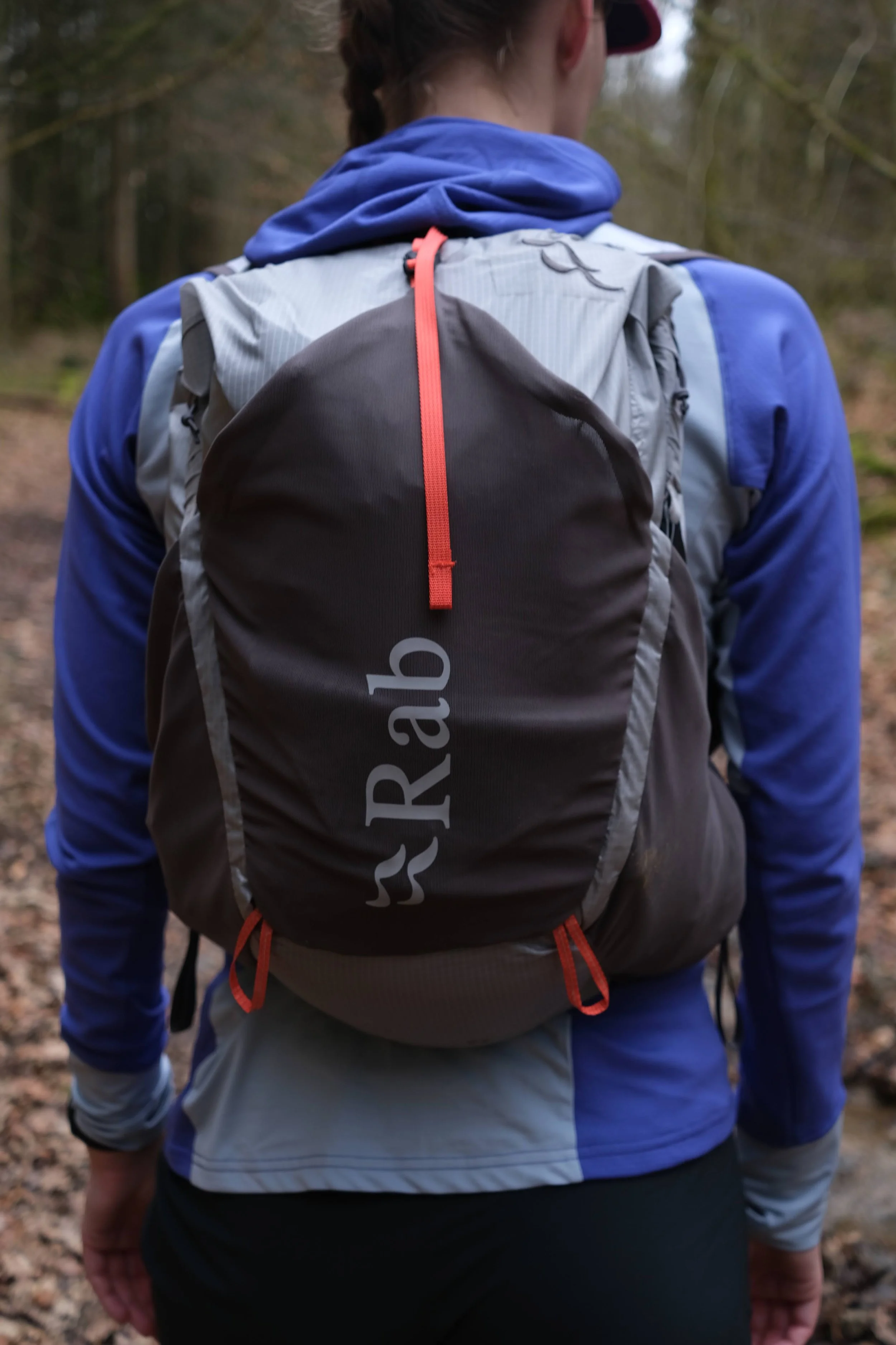 The back of the pack has a large mesh stash pocket and two loops.
