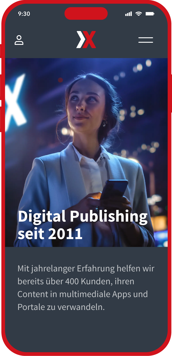 A woman in business attire using a smartphone at a technology conference with a digital publishing theme, characterized by navy and red colors and a large goal in the background.