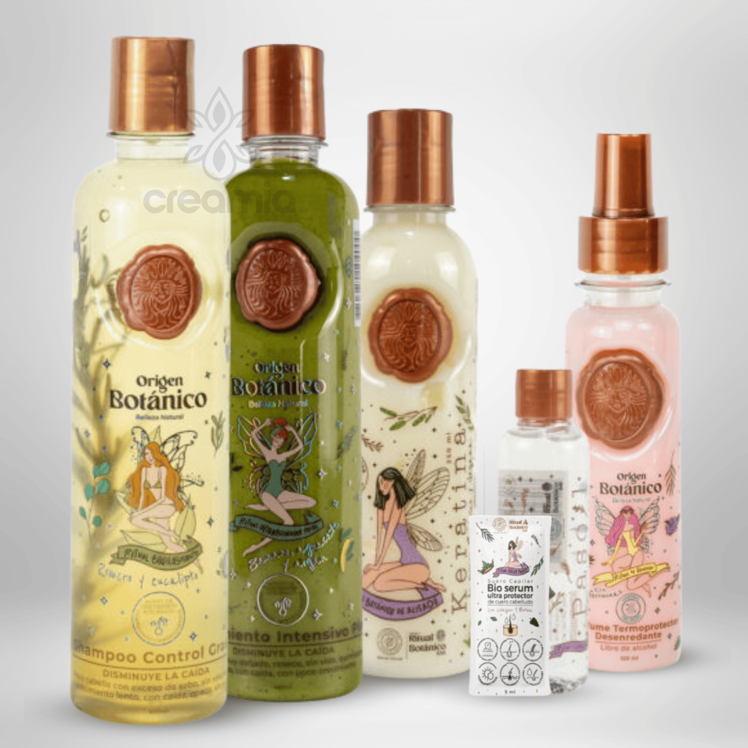 Collection of five bottles of hair and skincare products with labels featuring fairies, flowers, and botanical themes.