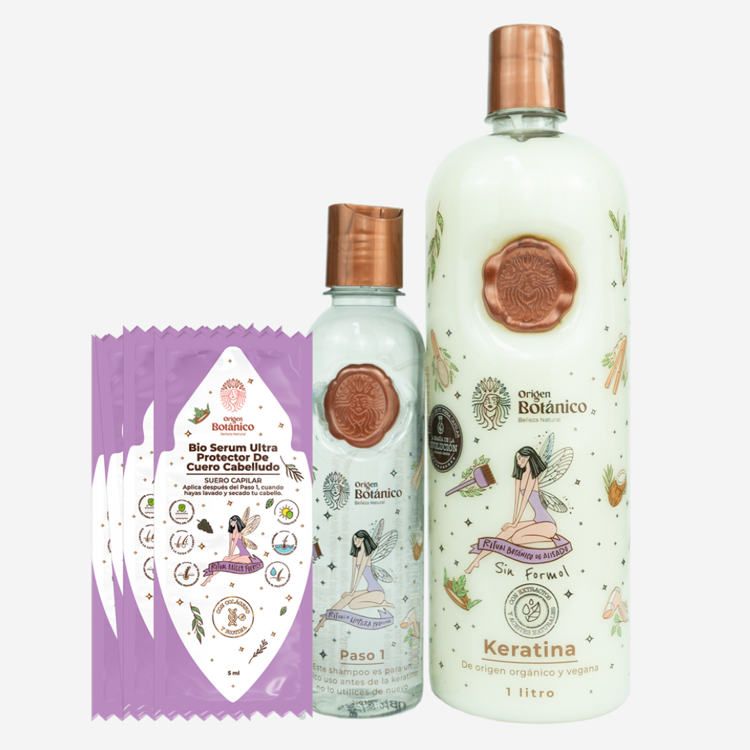 Two bottles with copper caps, a small packet, and a brochure featuring fairy illustrations, all related to hair care products, along with a round label emphasizing hair fiber protection and flexibility.