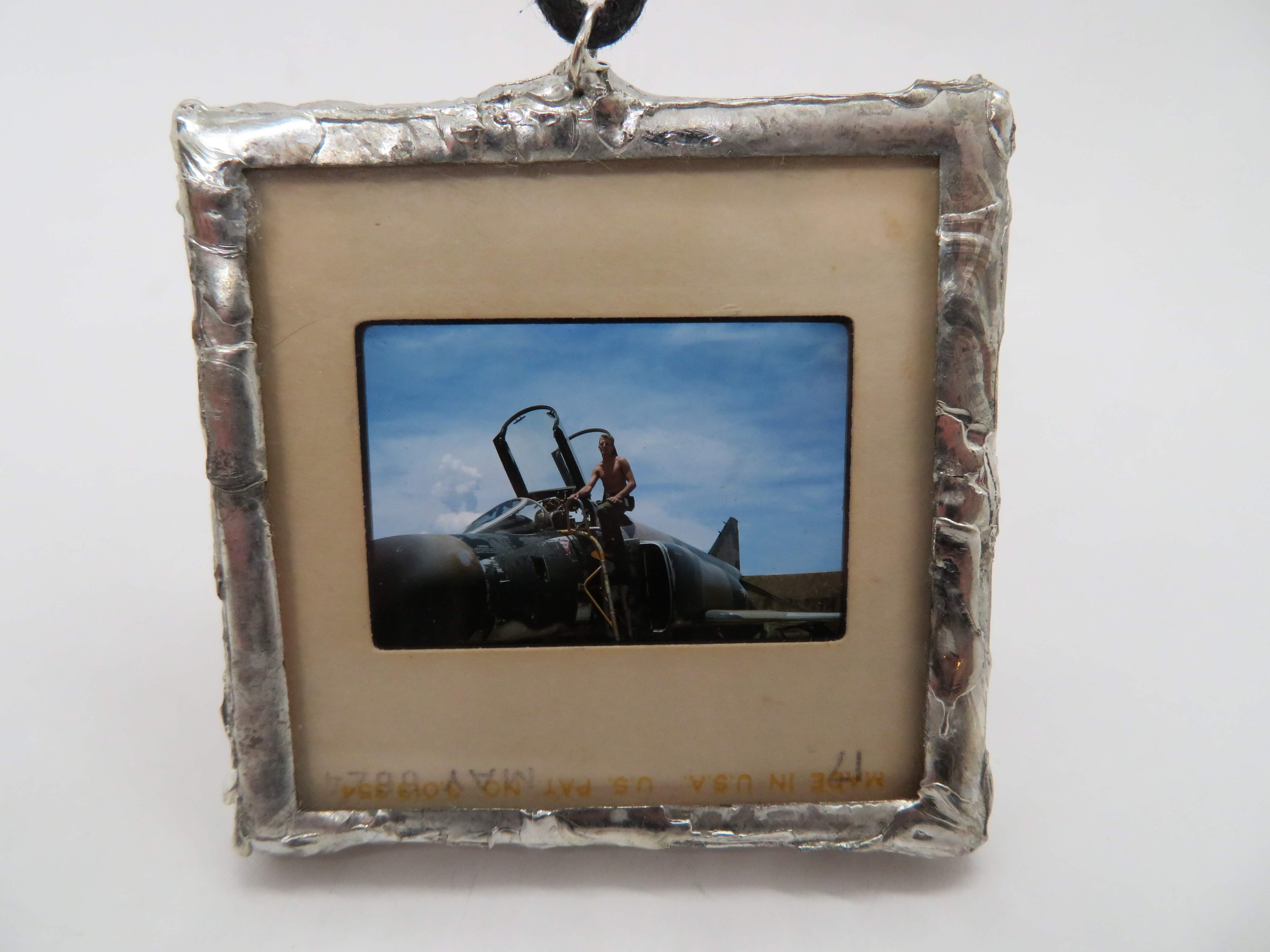 Slide Pendant of Vietnam Soldier Getting in Fighter Jet 2.jpg