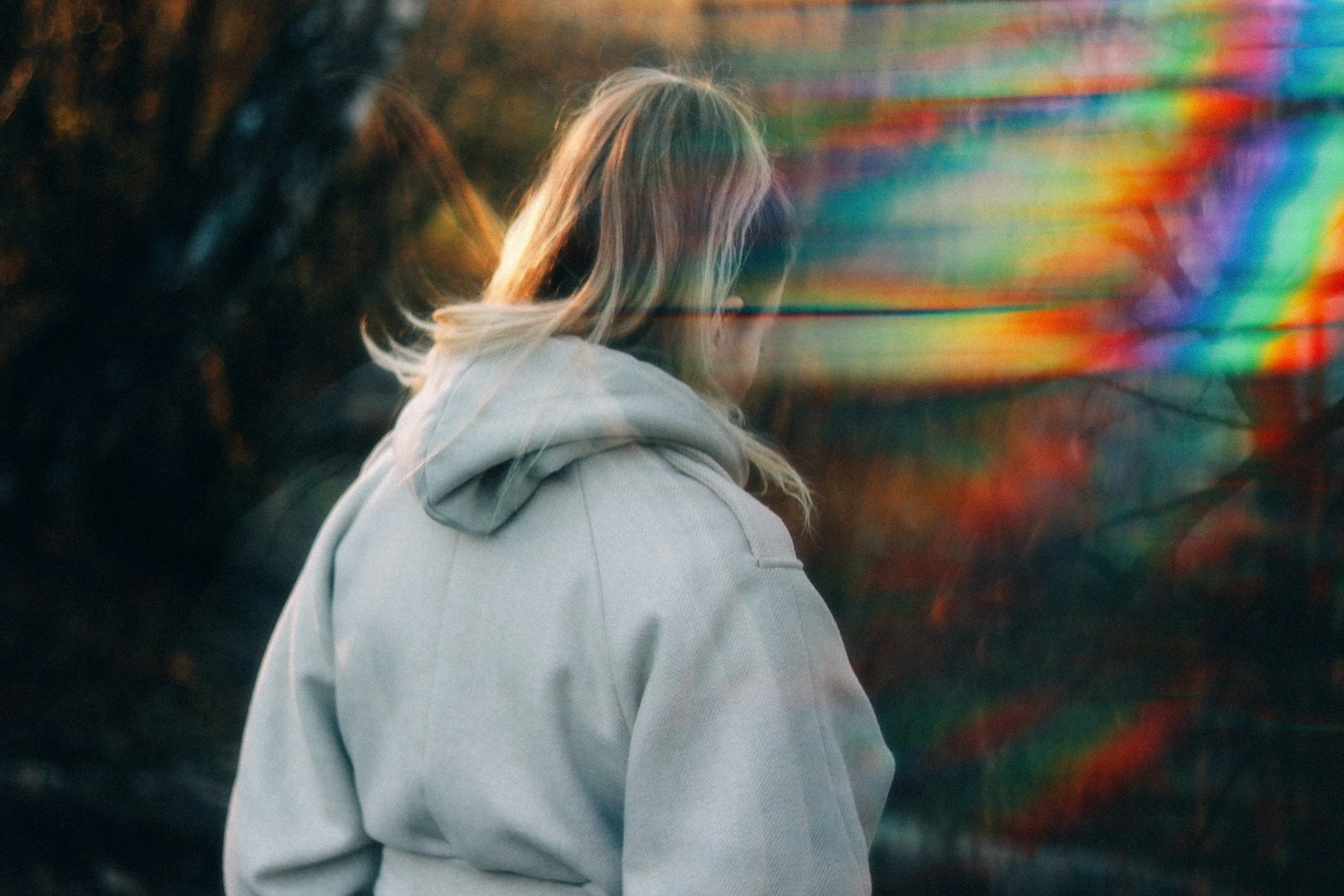 LGBTQ+ survivor of religious trauma reflecting during Pride Month