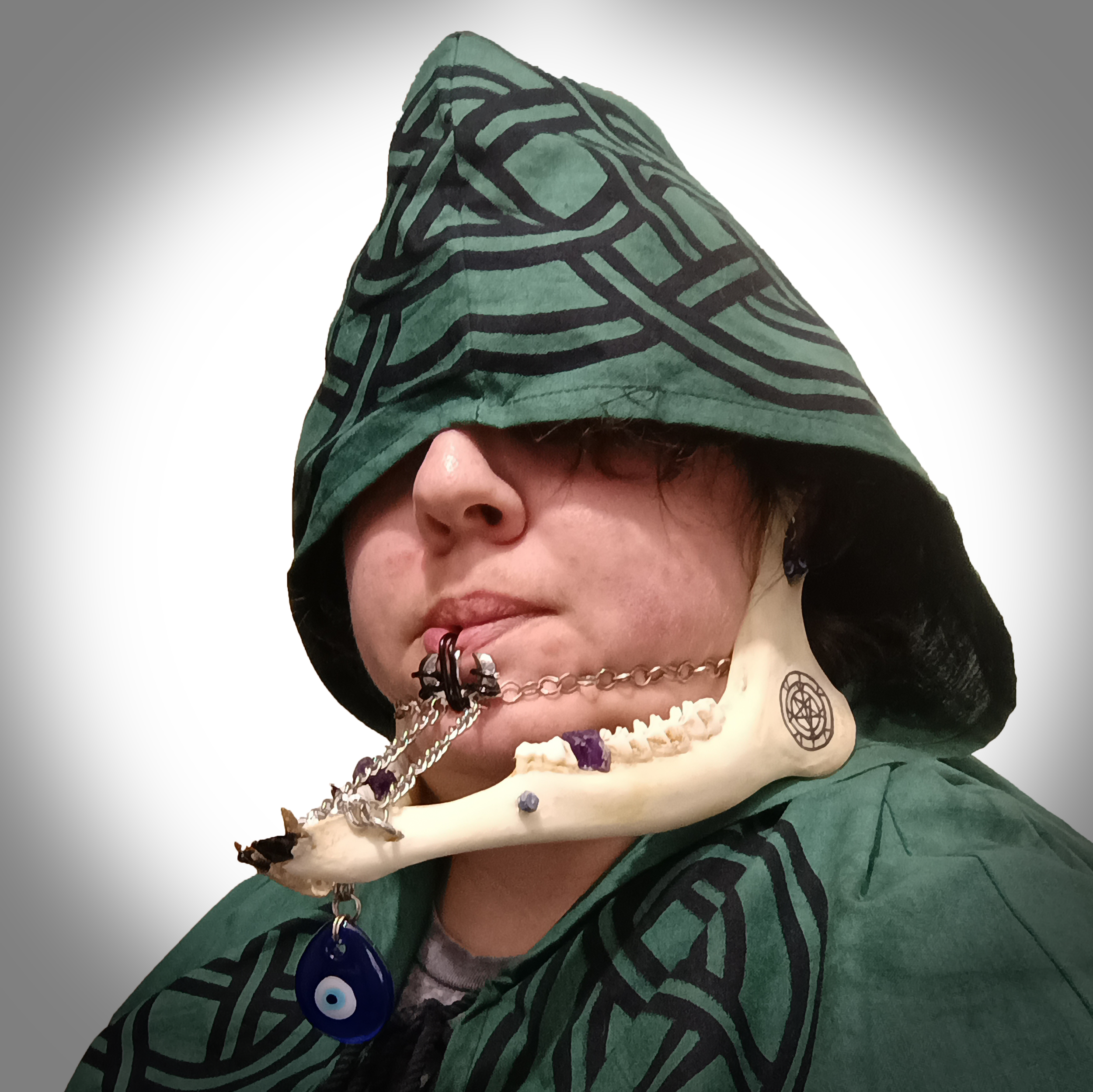 Jaw Cage; deer jaw, chain, glass beads, citrine, amethyst, sapphire, obsidian, tiger's eye; 2024