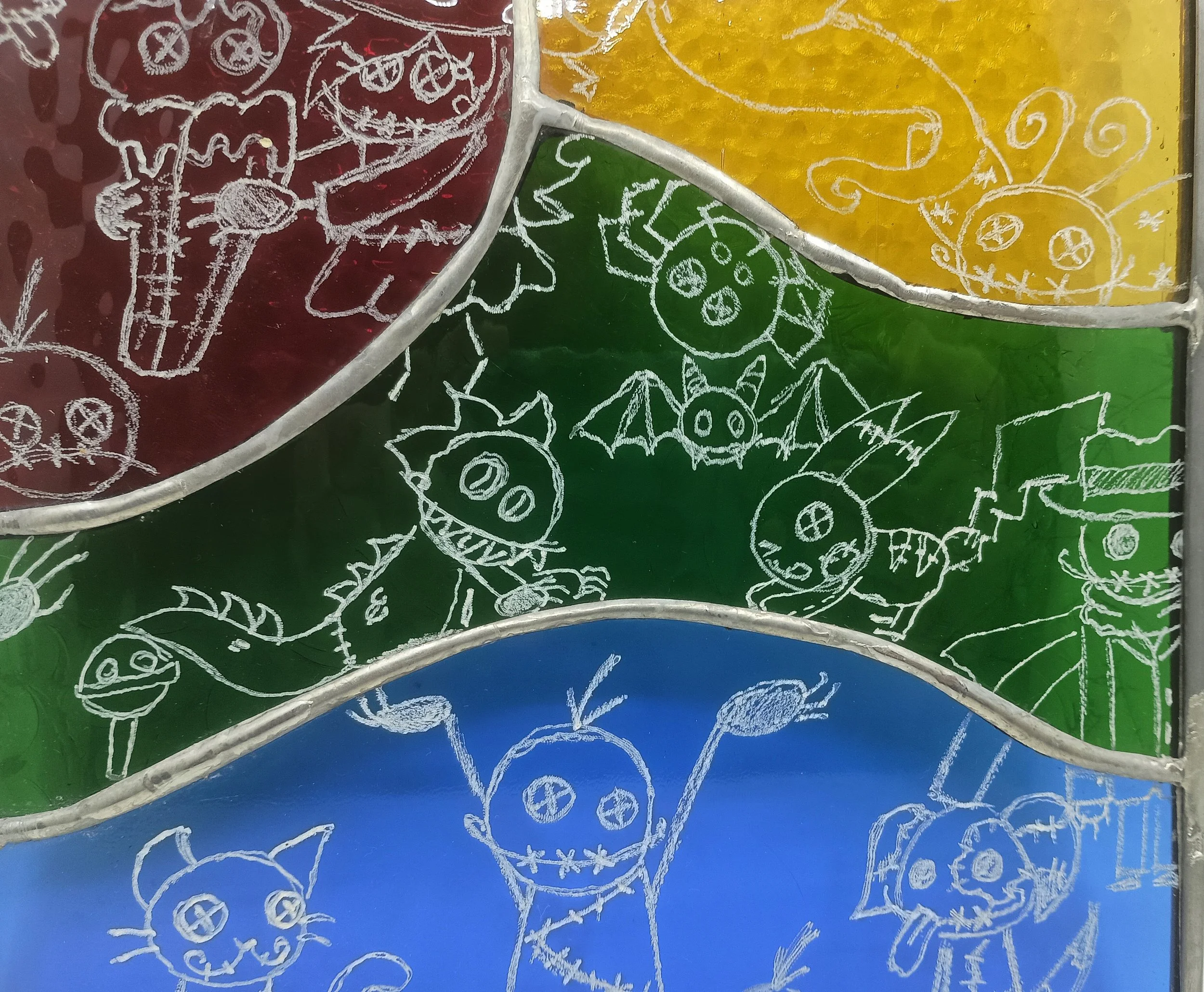 Omni Palooza Detail; stained glass, lead solder, oil paint, 2025