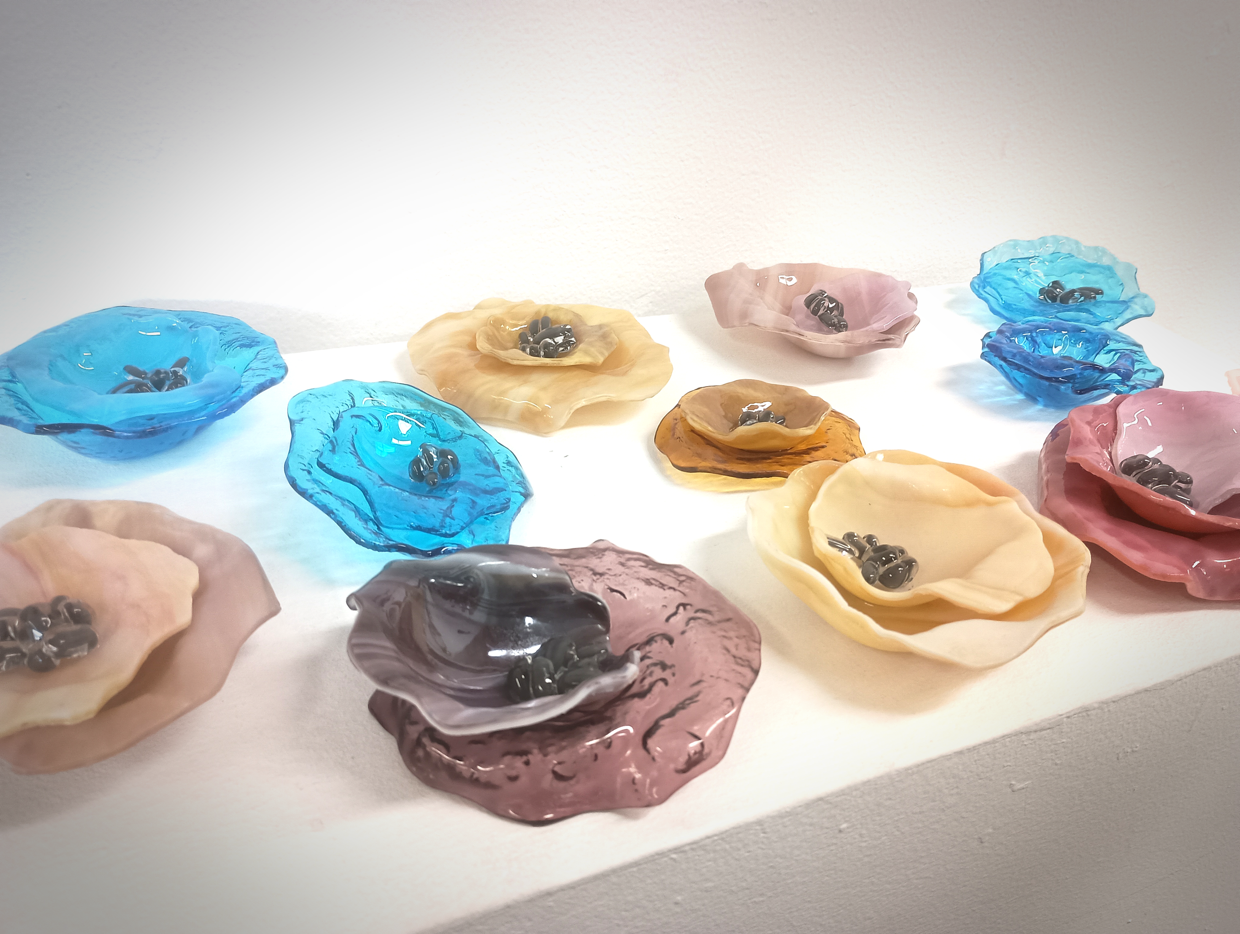 Beauty in Gore Detail; glass, lead solder, copper chain, acrylic paint, 2025