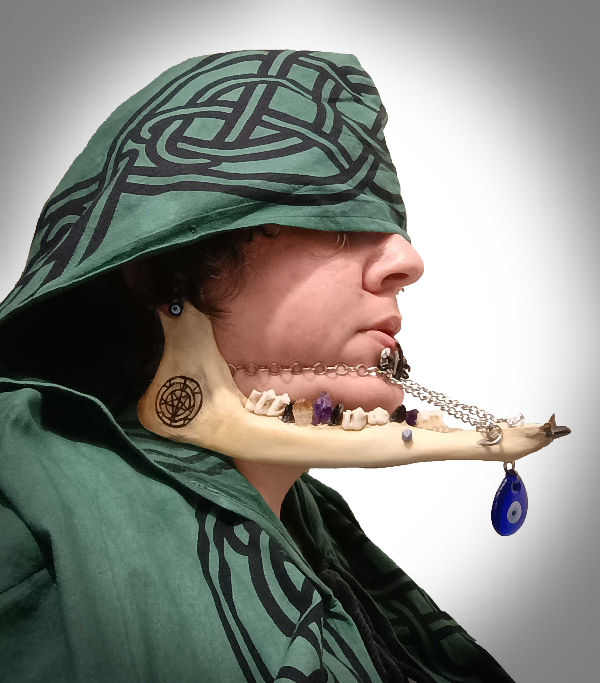 Jaw Cage; deer jaw, chain, glass beads, citrine, amethyst, sapphire, obsidian, tiger's eye; 2024