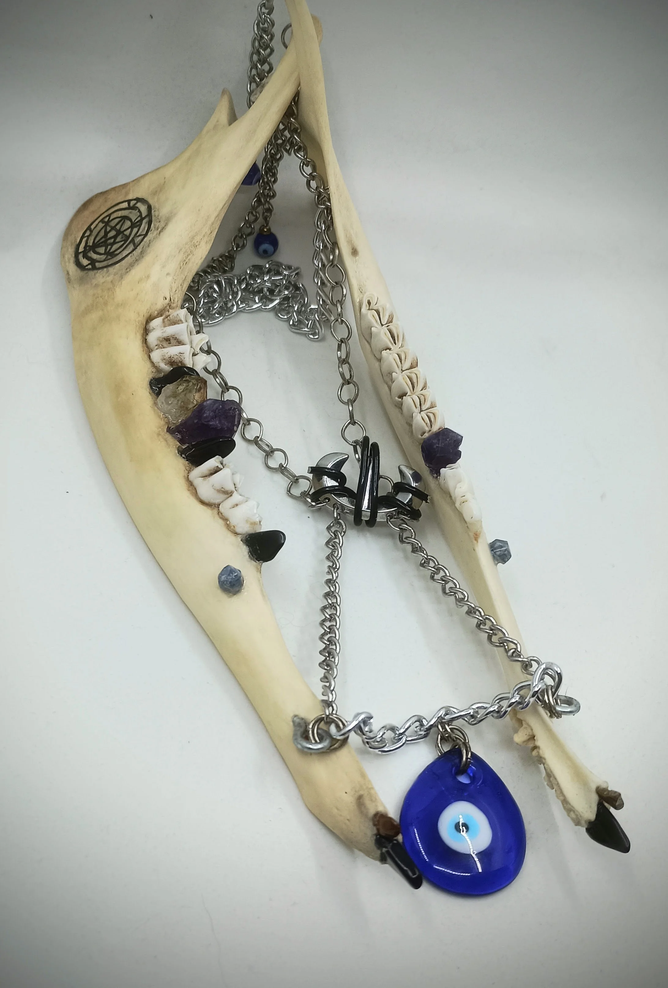Jaw Cage, deer jaw, chain, glass beads, citrine, amethyst, sapphire, obsidian, tiger's eye, 2024