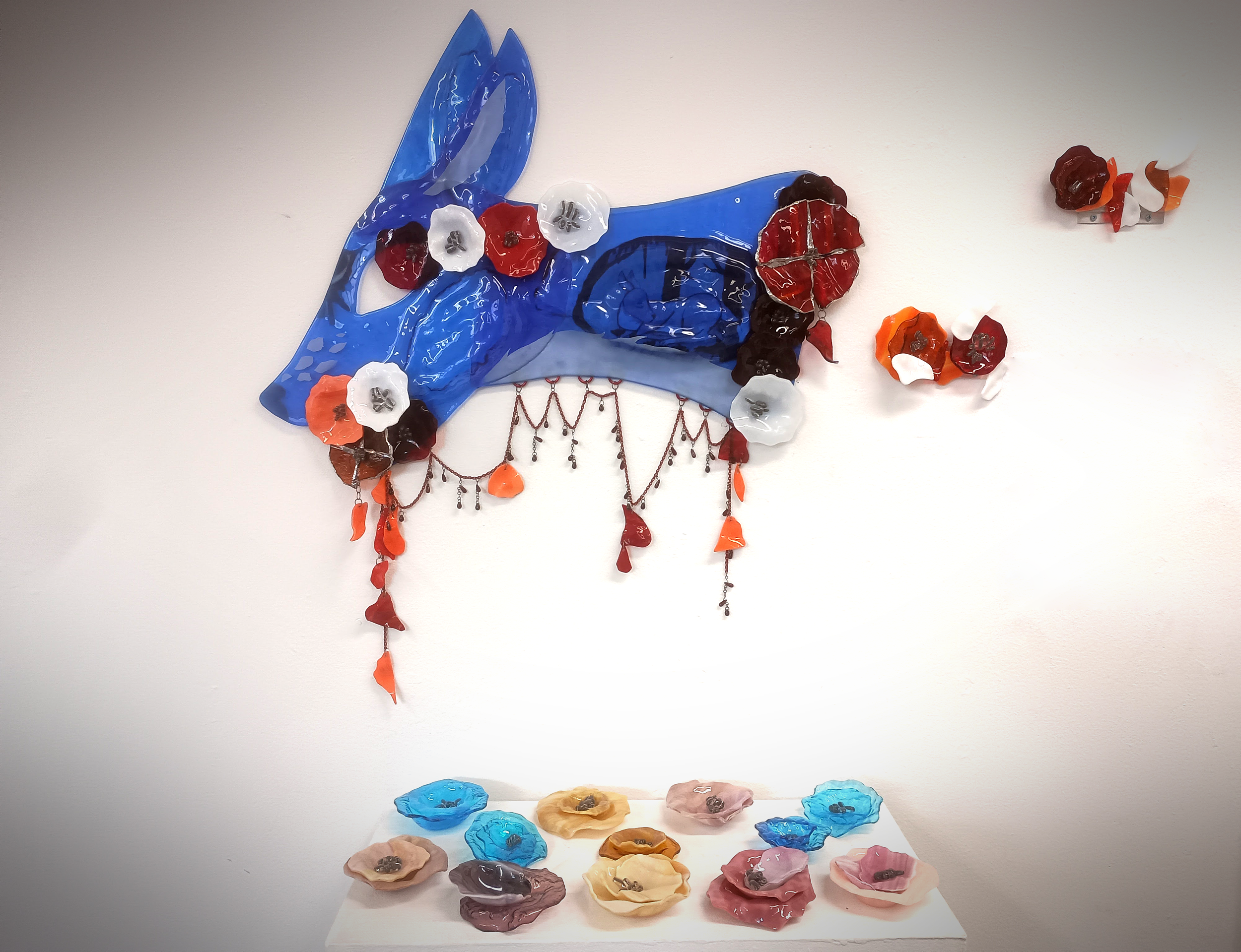 Beauty in Gore; glass, lead solder, copper chain, acrylic paint, 2025