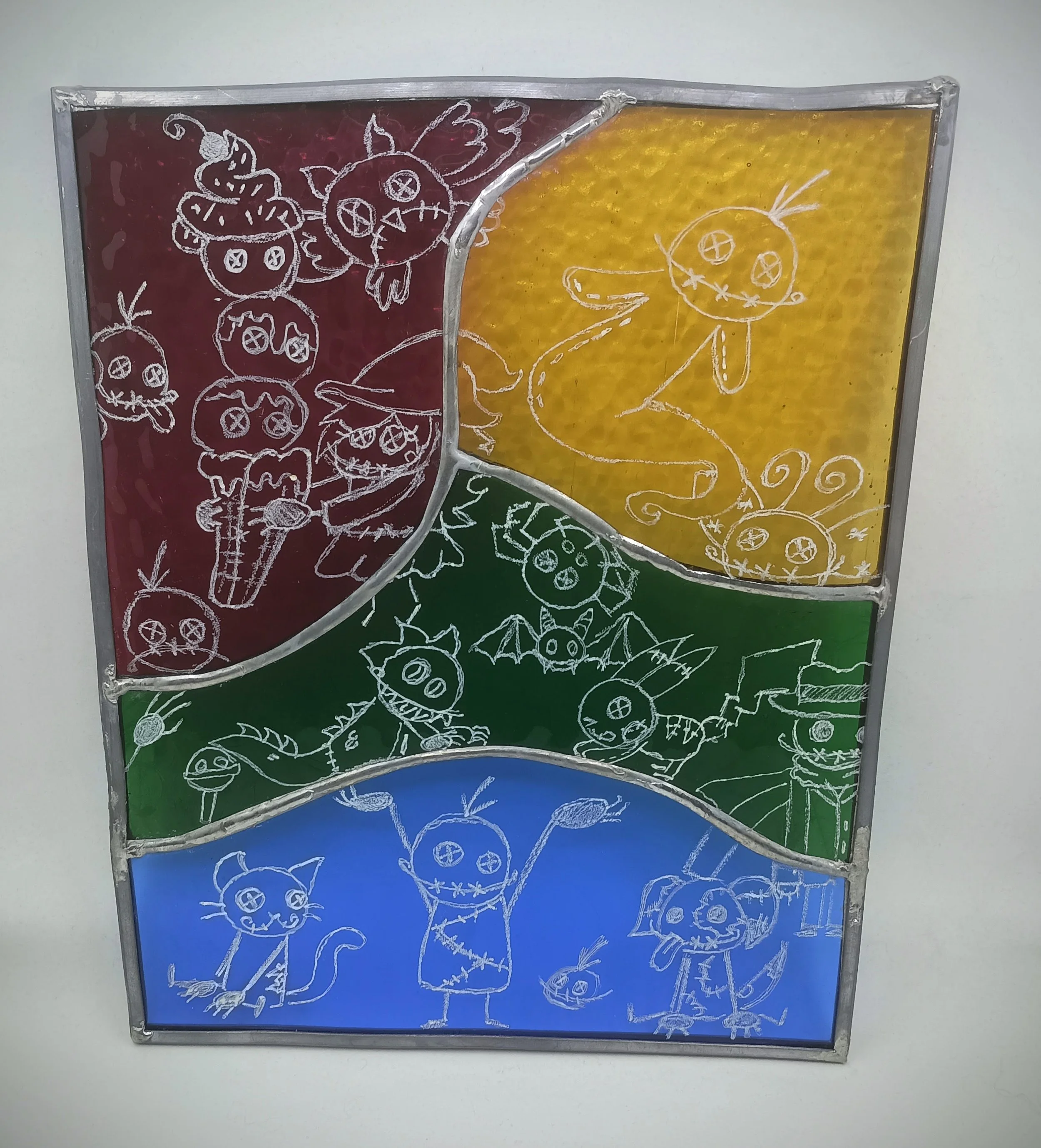 Omni Palooza; stained glass, lead solder, oil paint, 2025