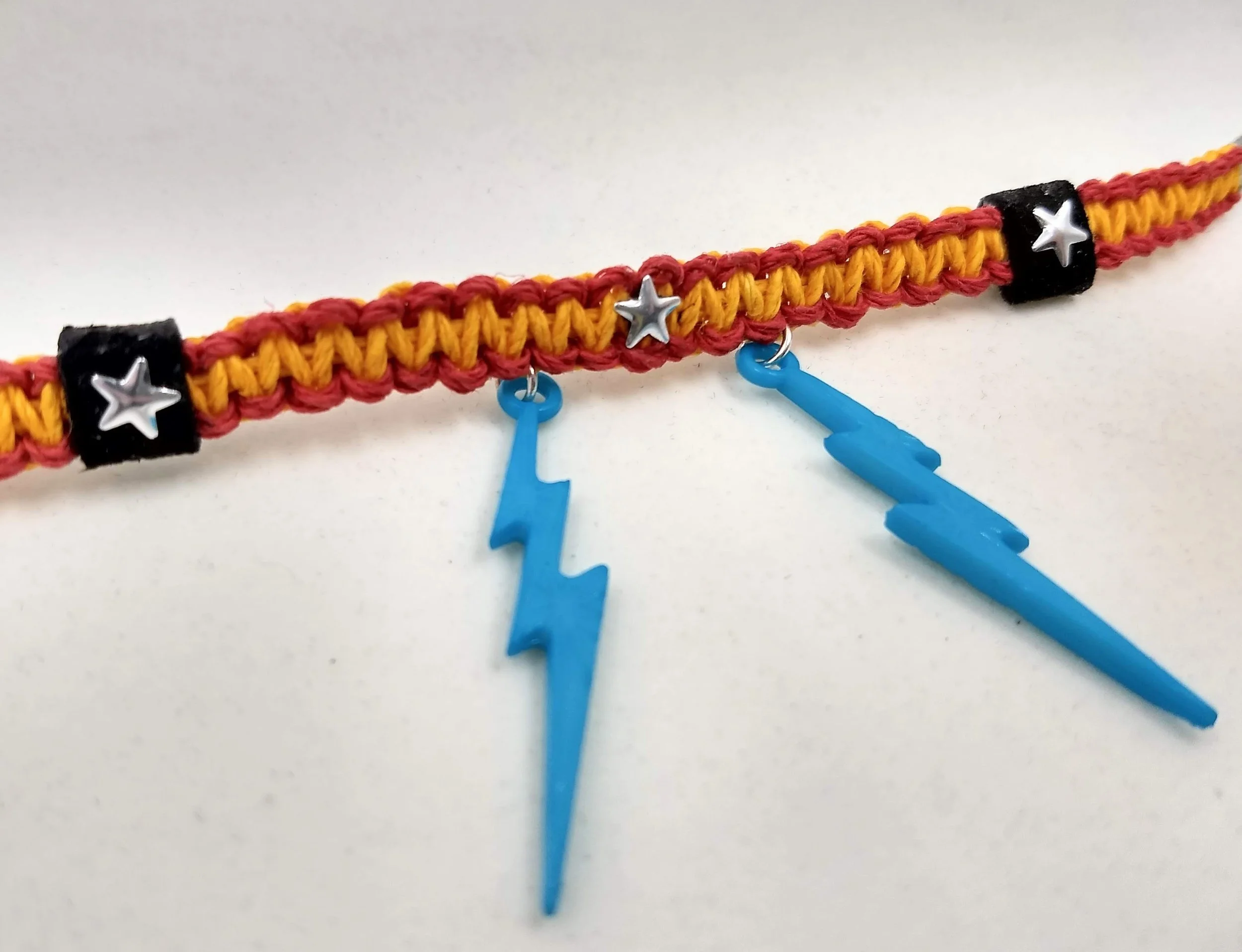 Freddy Bracelet;  hemp cording, charms, ribbon; 2022