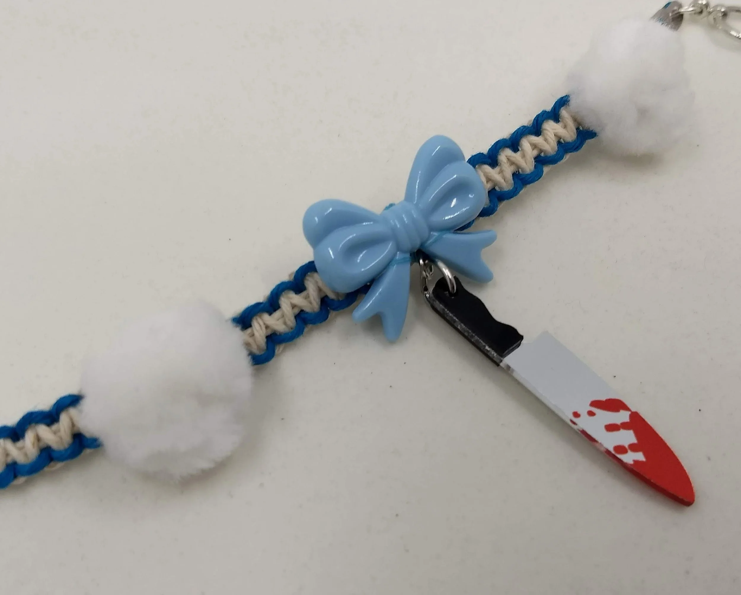 Vanny Bracelet;  hemp cording, charms, beads, pompopms; 2022