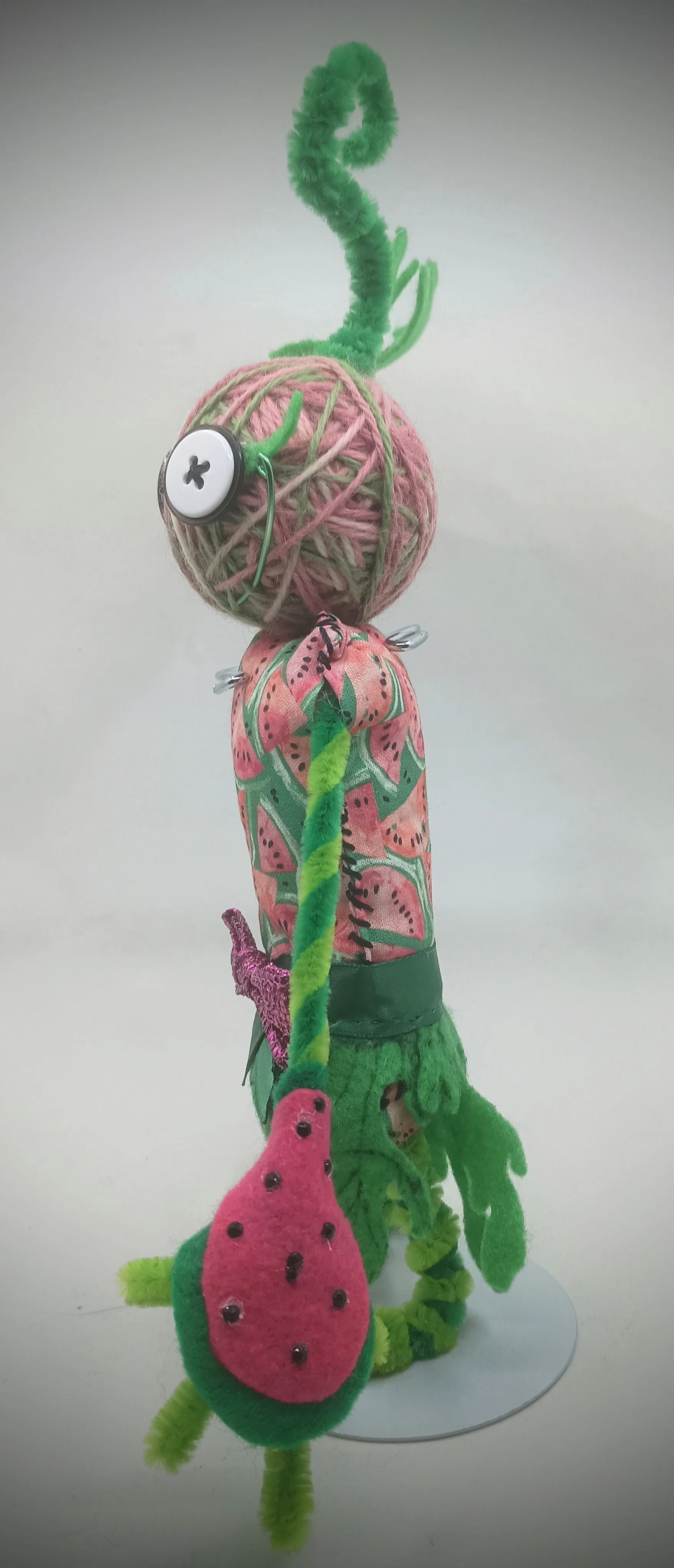 Watermelon Omni Doll, yarn, buttons, pipe cleaners, felt, wire, ribbon, 2026