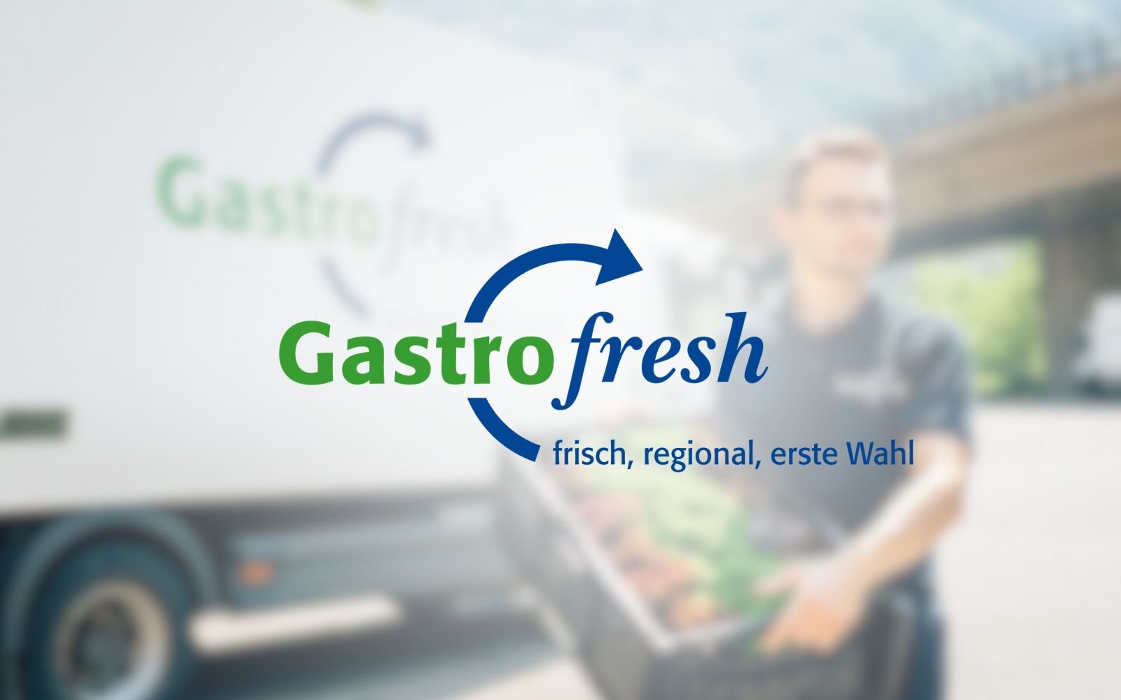 Gastrofresh logo on food truck with a woman in the background holding a tray of food, outdoors.