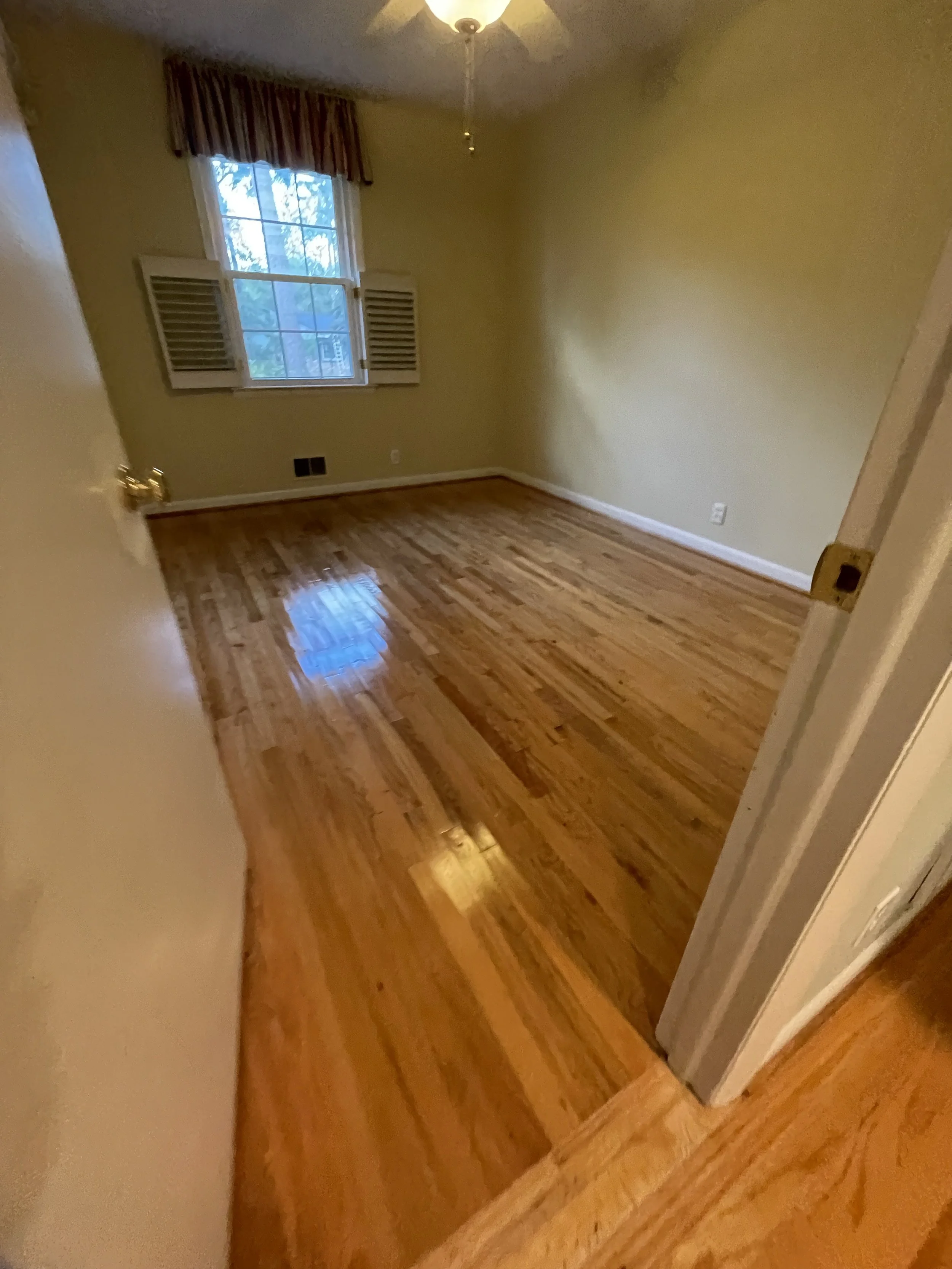 “Refinished oak hardwood floor in Augusta residential living room by ProCoat Flooring Solutions”
