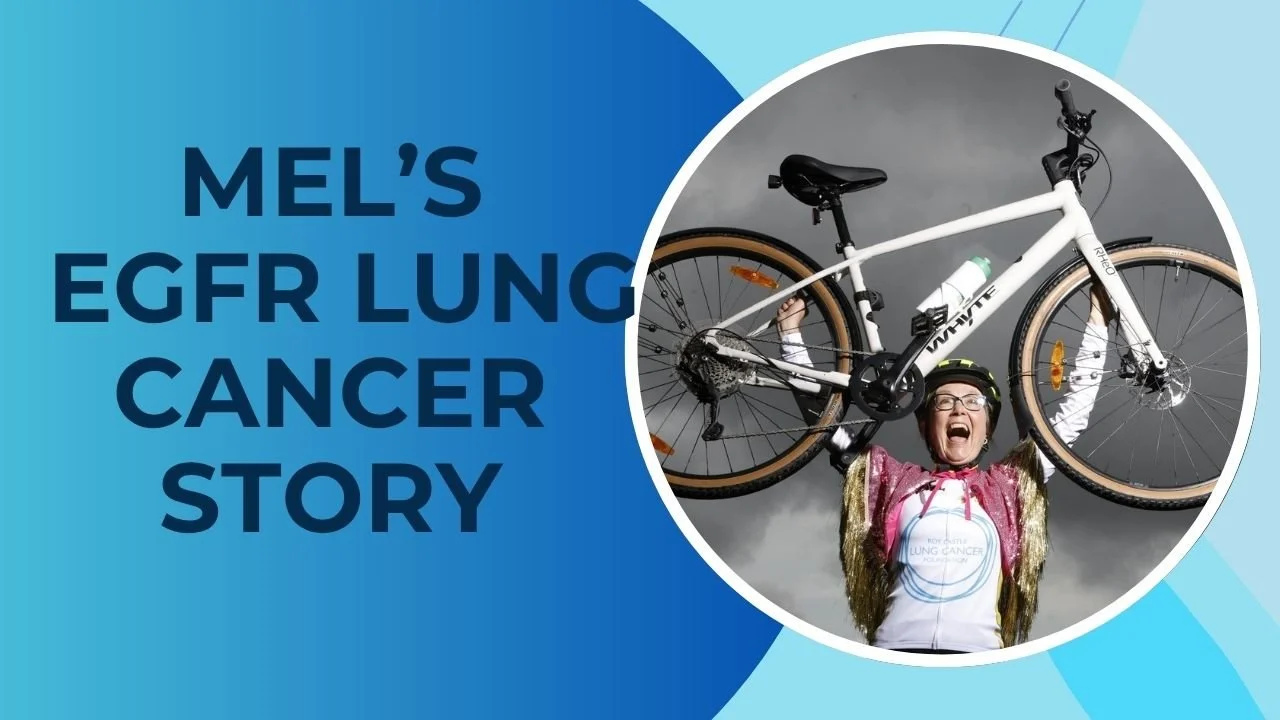 Photo of Mel, holding a bike over her head and wearing a bike helmet - who was diagnosed with EGFR lung cancer aged 53. First stage 2 and later stage 4.