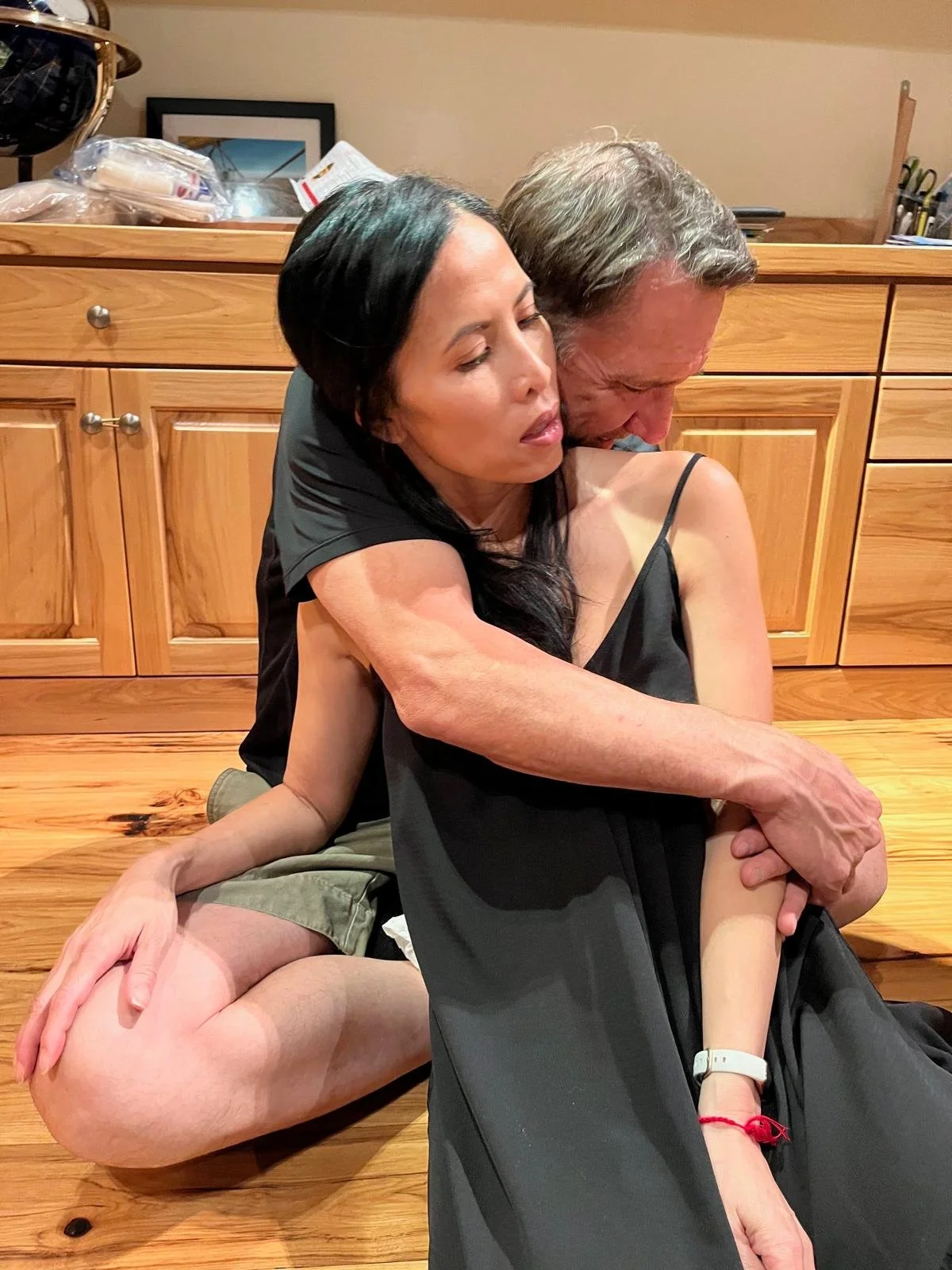 Kimberly's husband embraces her on the back of what looked like a bleak diagnosis.