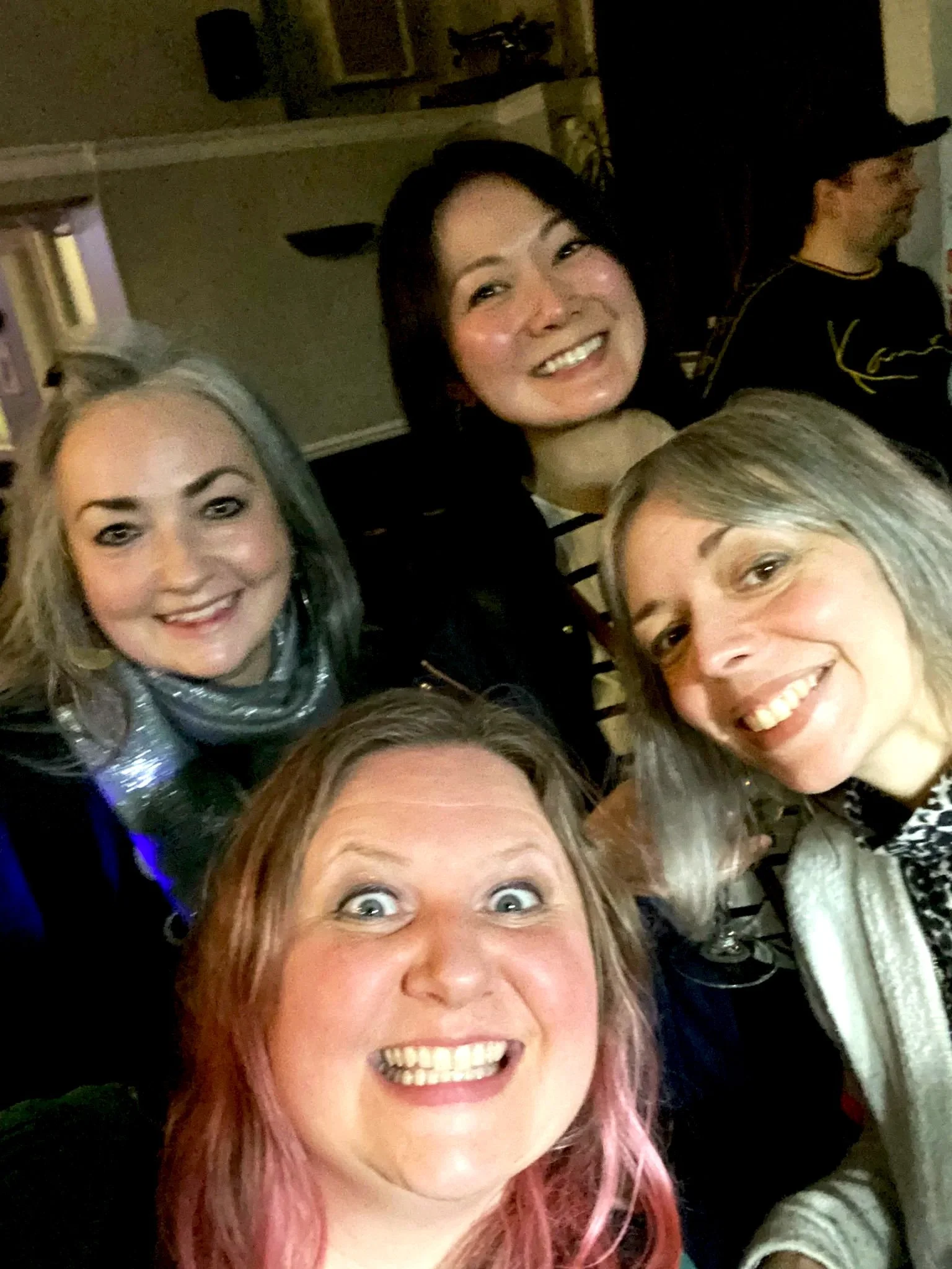 Nichol, left, pictured smiling with three other girl friends dressed up to go out.