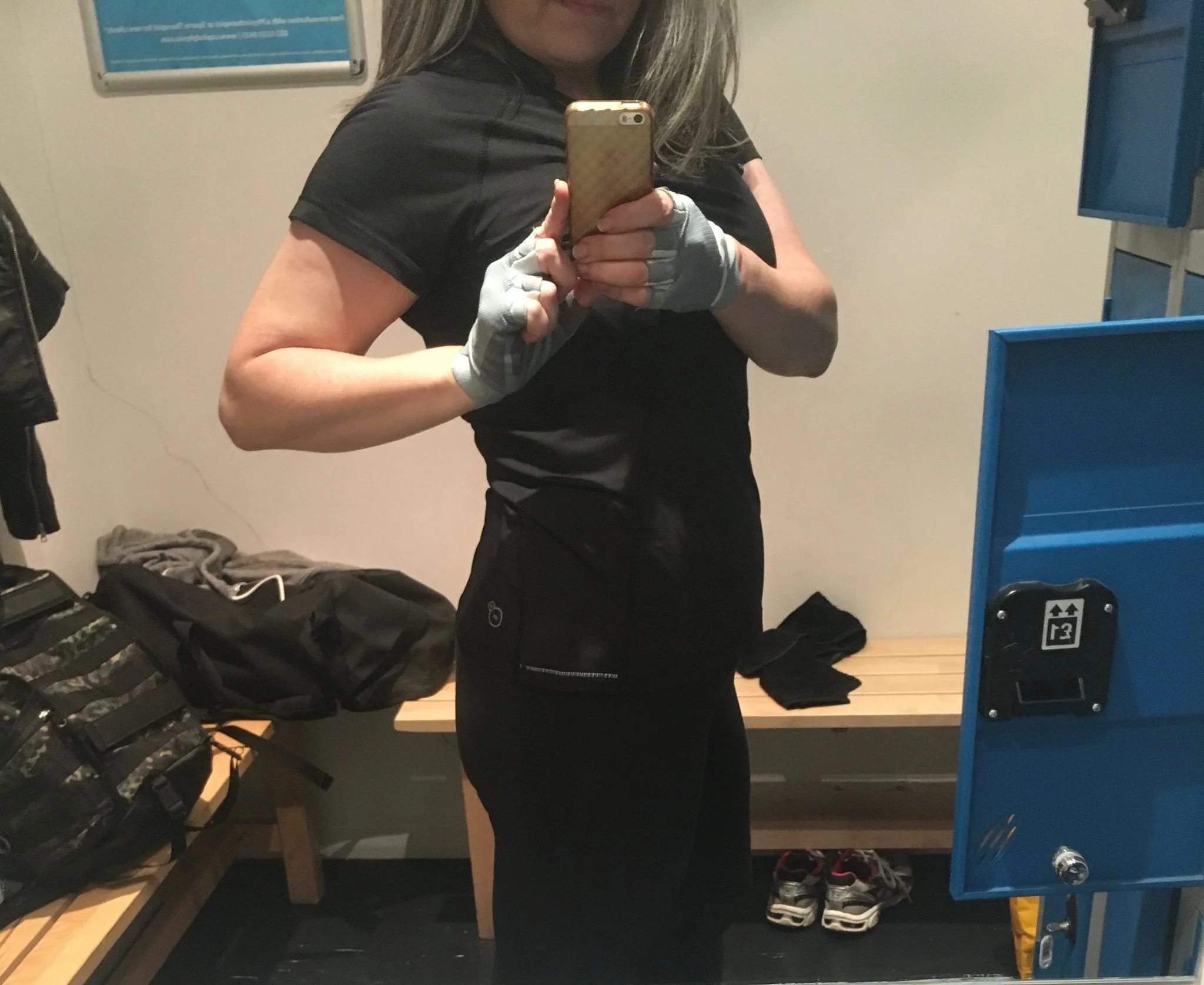 Selfie shot of Nichol working out from the lips down, showing a very fit physique. This was her just as she was about to receive a stage 3A lung cancer diagnosis.