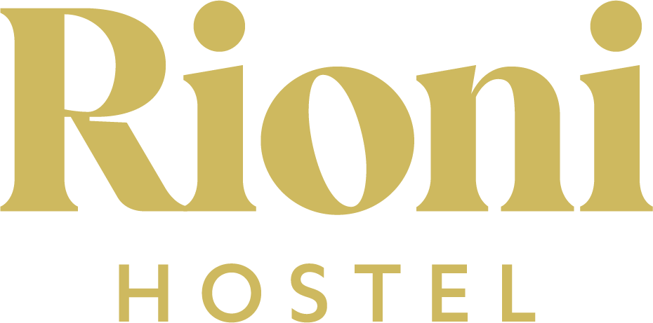 Gold wordmark version of Rioni Hostel Logo
