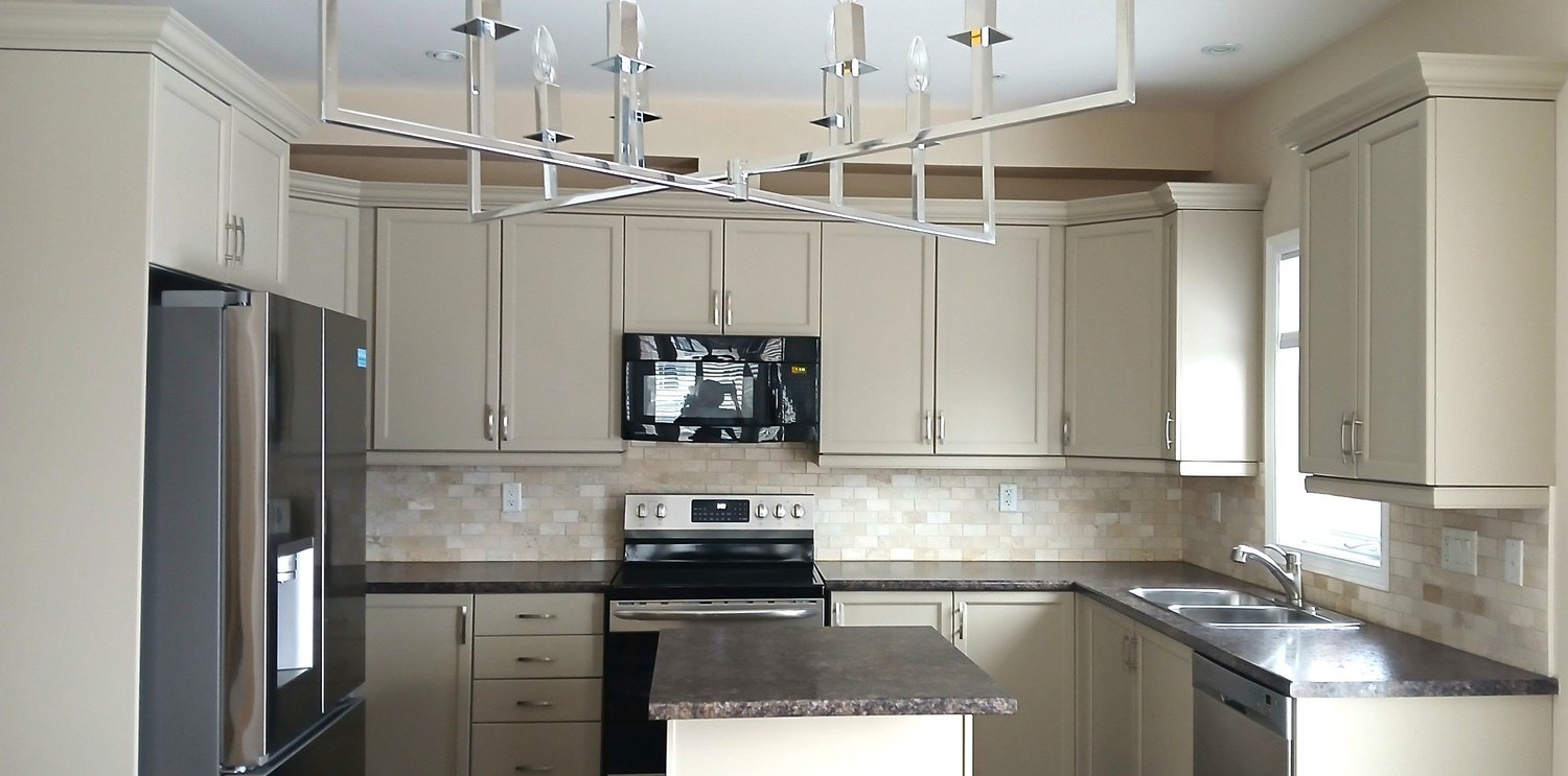 The same kitchen after: freshly coated cabinets