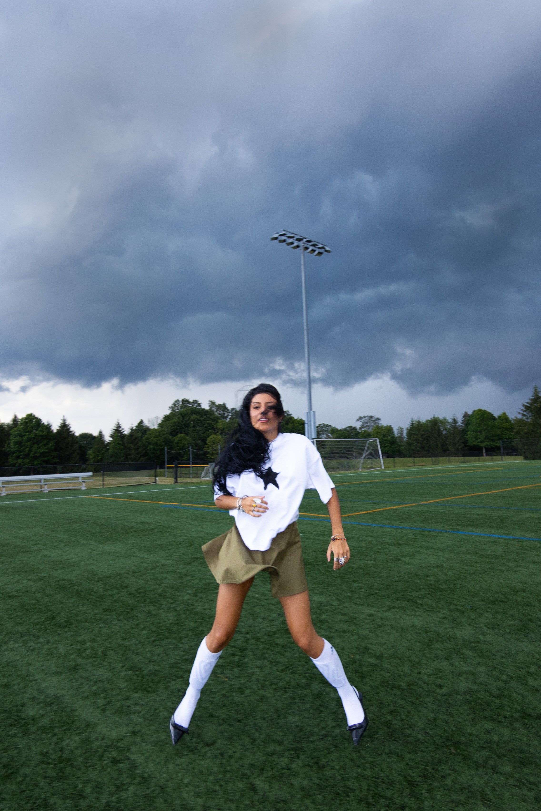 Tiff Runnning in Feild.jpg