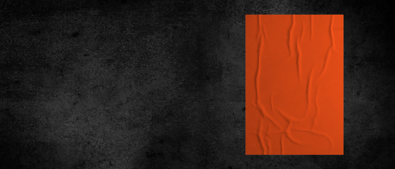 Close-up of an orange textured fabric with wavy lines.