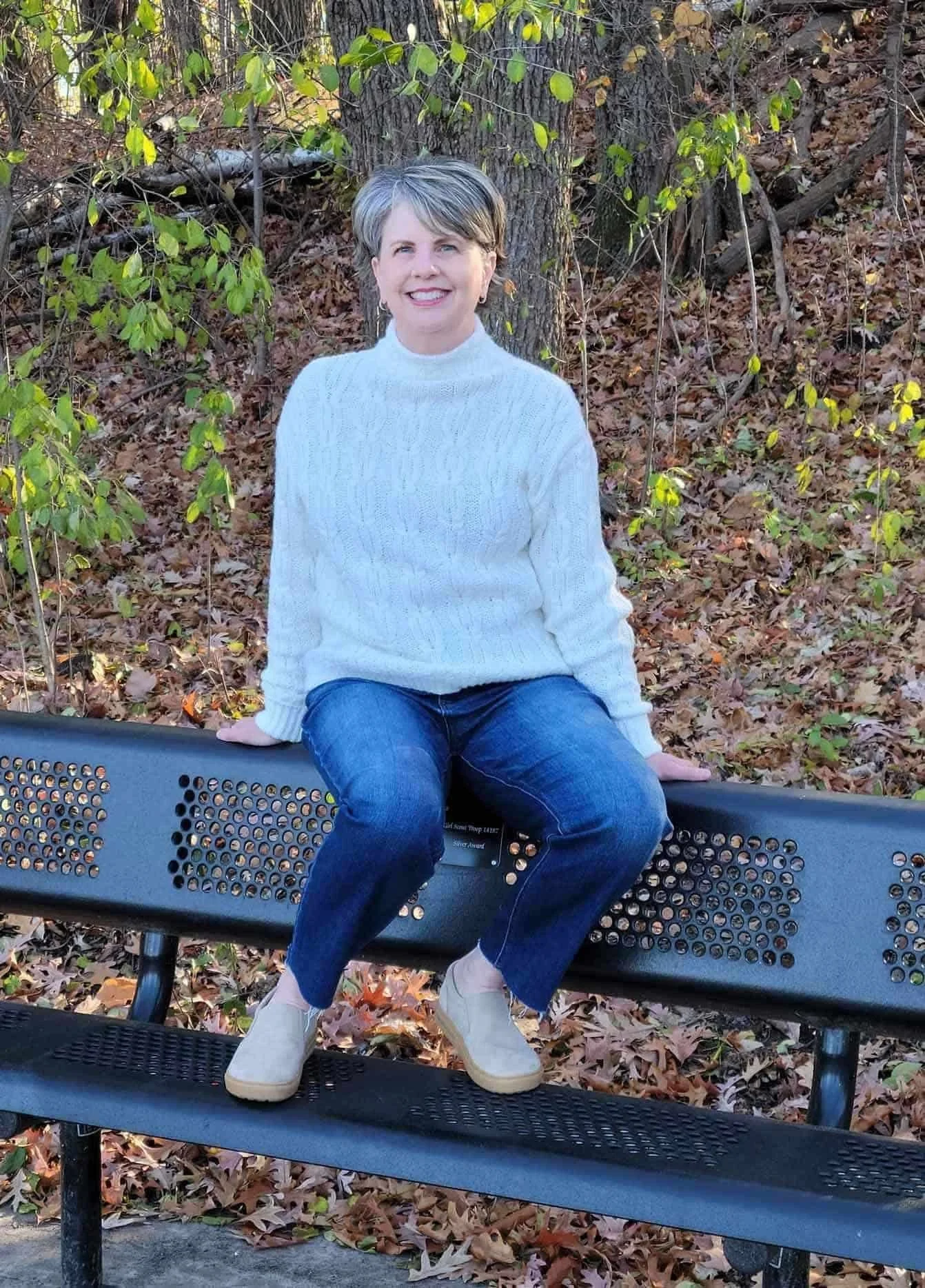 Kristin sitting on a park bench