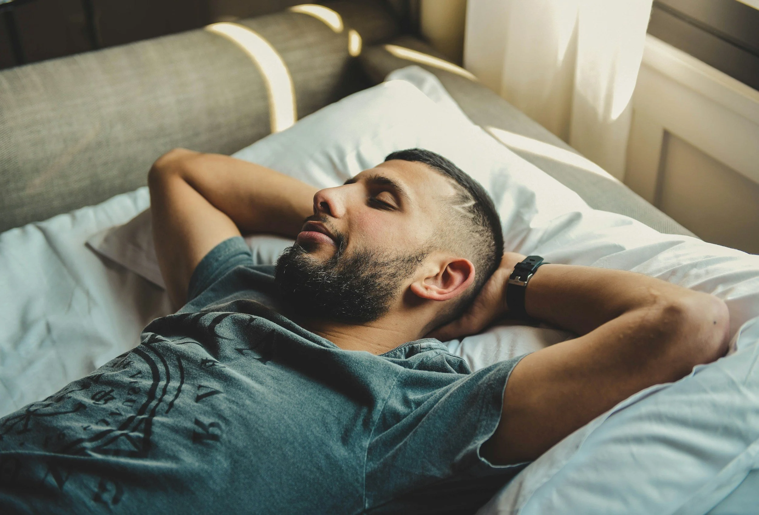 Man relaxing and sleeping well so that his lifestyle supports successful medication management