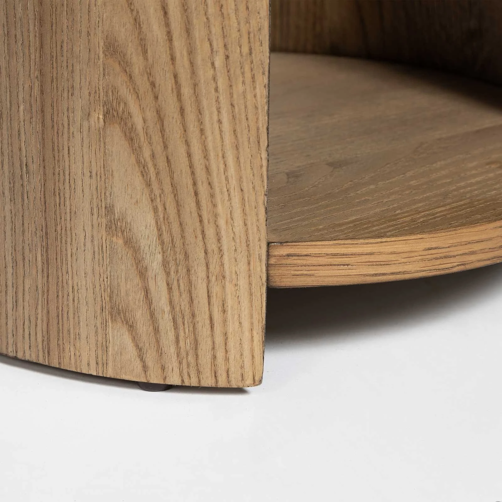 Close-up of Bottom of modern side table curved support panel - Rustic Oak