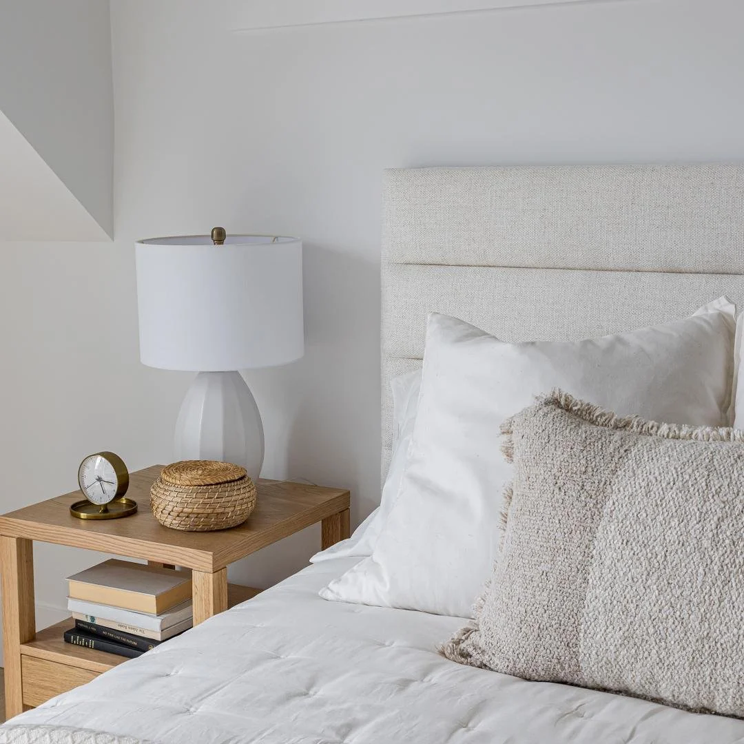 Styled modern bedroom featuring the 1 Tall Storage Bed in cream upholstery