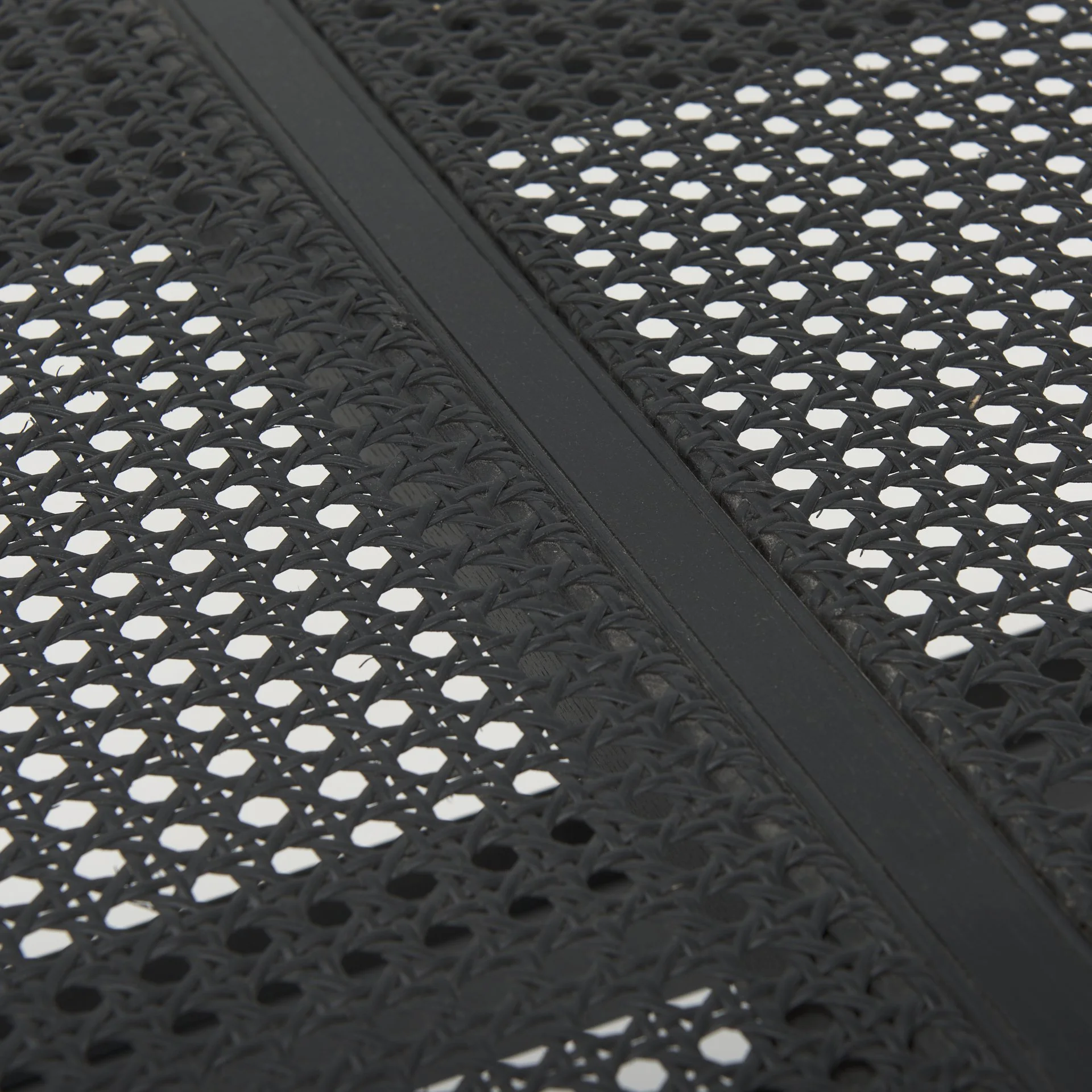 Tope Detail on Cane Seat Wood Black Bench.jpeg