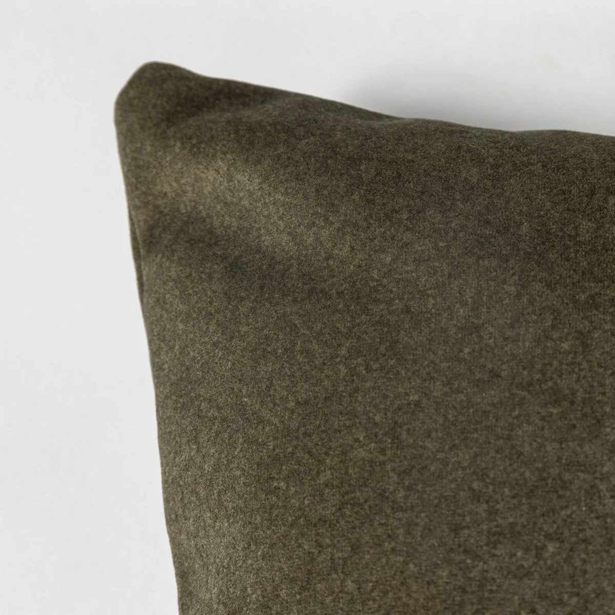 Dark-green-lumbar-pillow-seam-corner.jpg