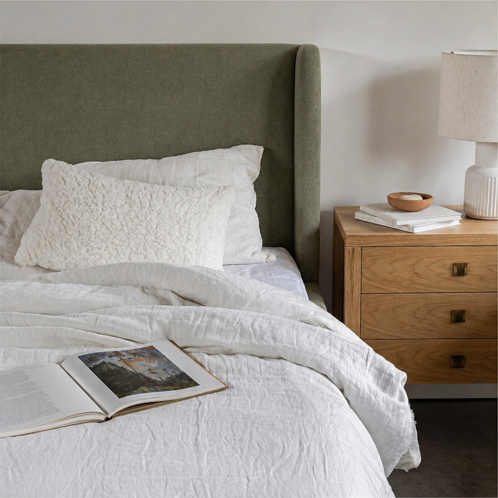 77 king size bed featuring tall padded upholstered headboard