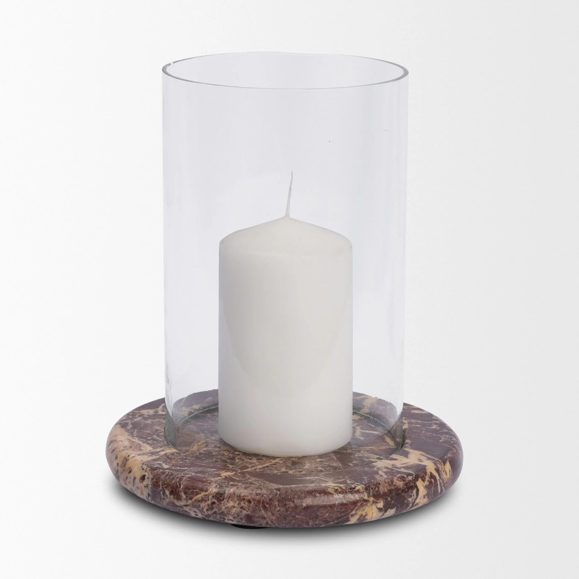 Styled view of the modern organic red marble candle holder with its glass casing attached.