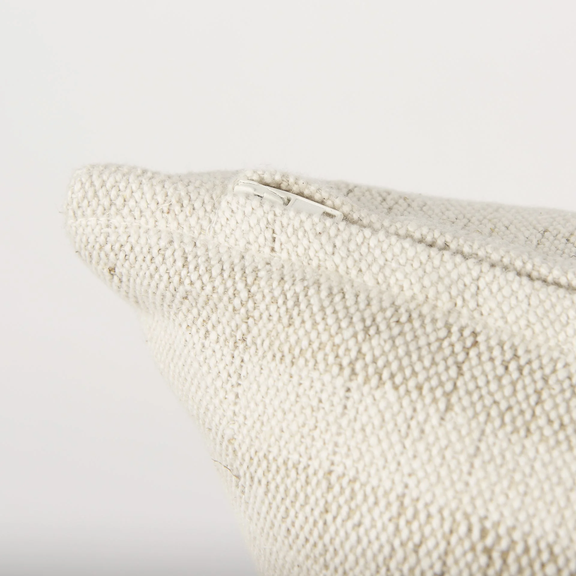 Zipper detailing on cream and beige linen lumbar decorative pillow