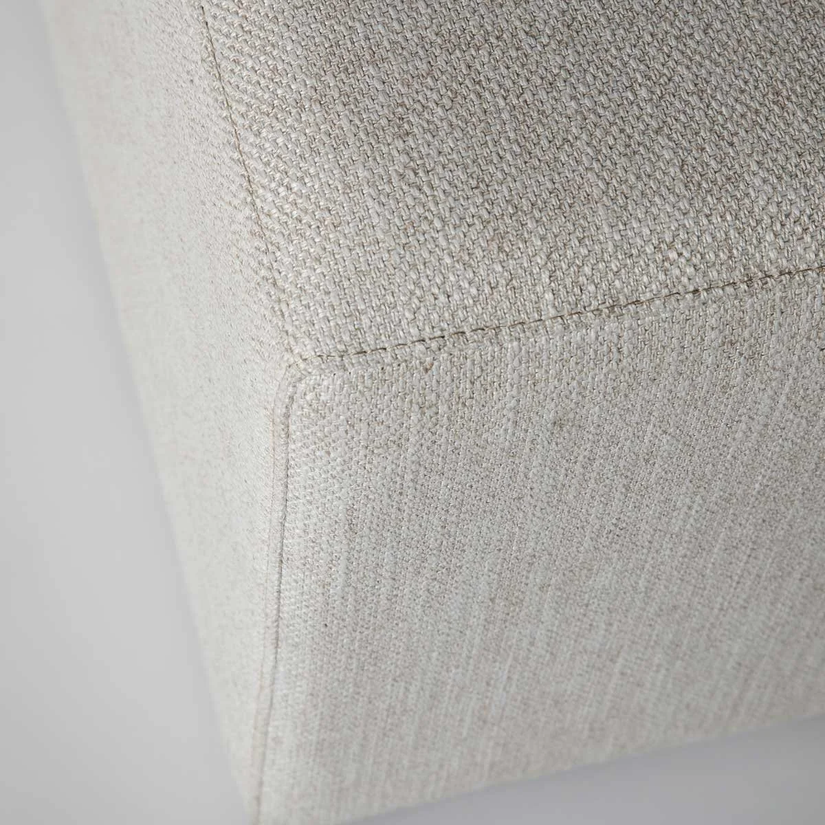Bench-ottoman-uphostlered-cream-fabric-with--dark-wood-waterfall-table-fabric-detail.jpg