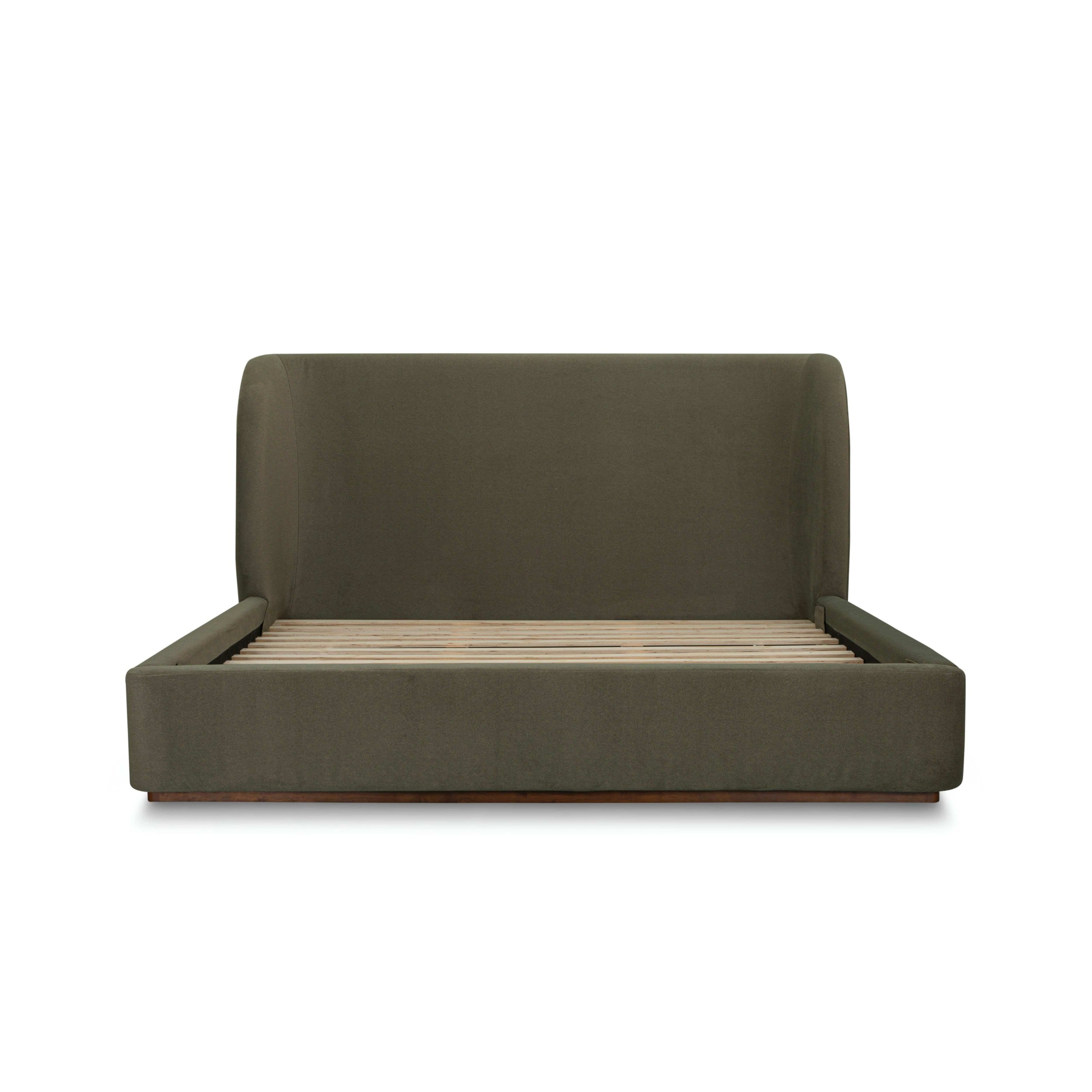 Front view of 77 king size upholstered bed in rich green velvet fabric