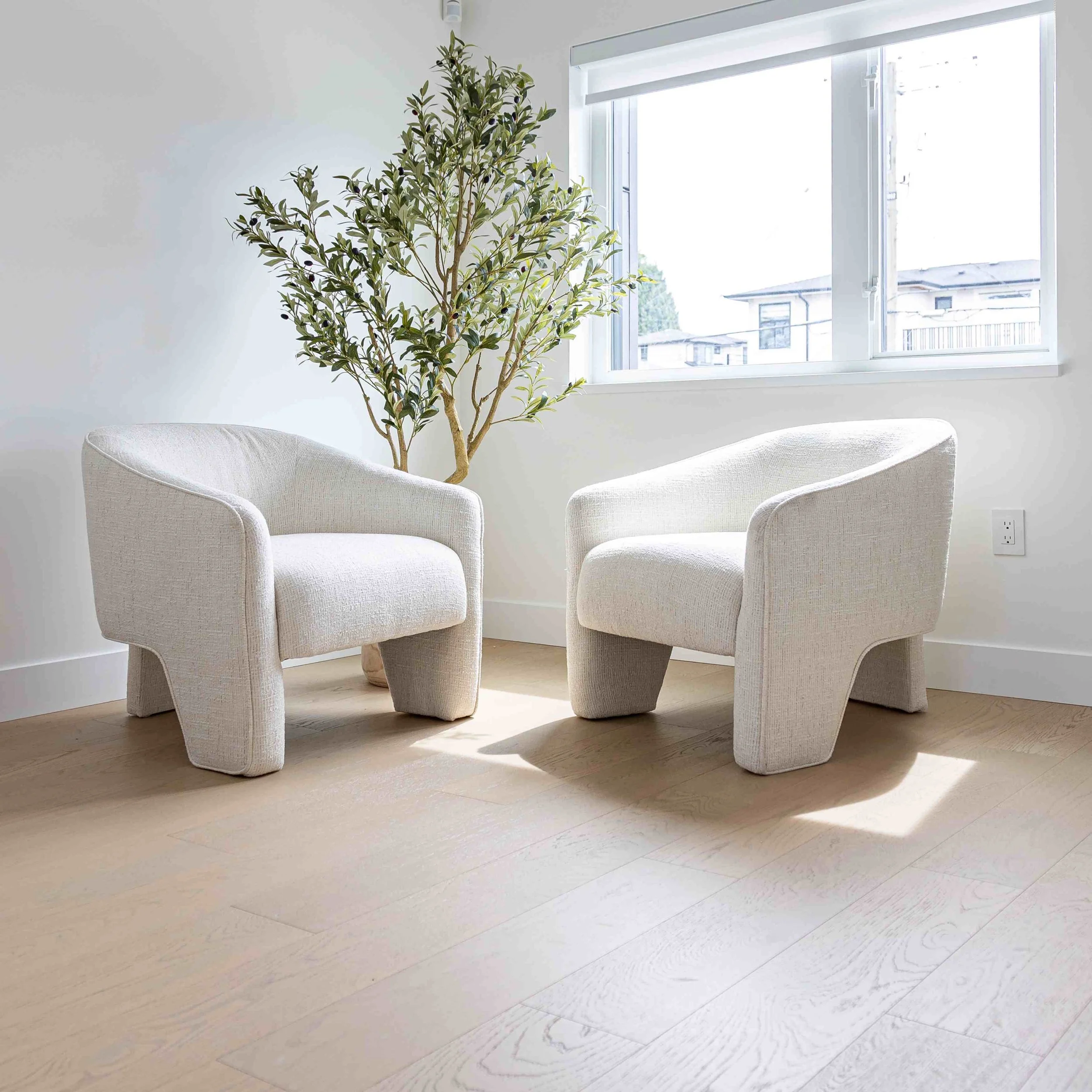 25 Upholstered Chair Styled in sunlit window.jpeg