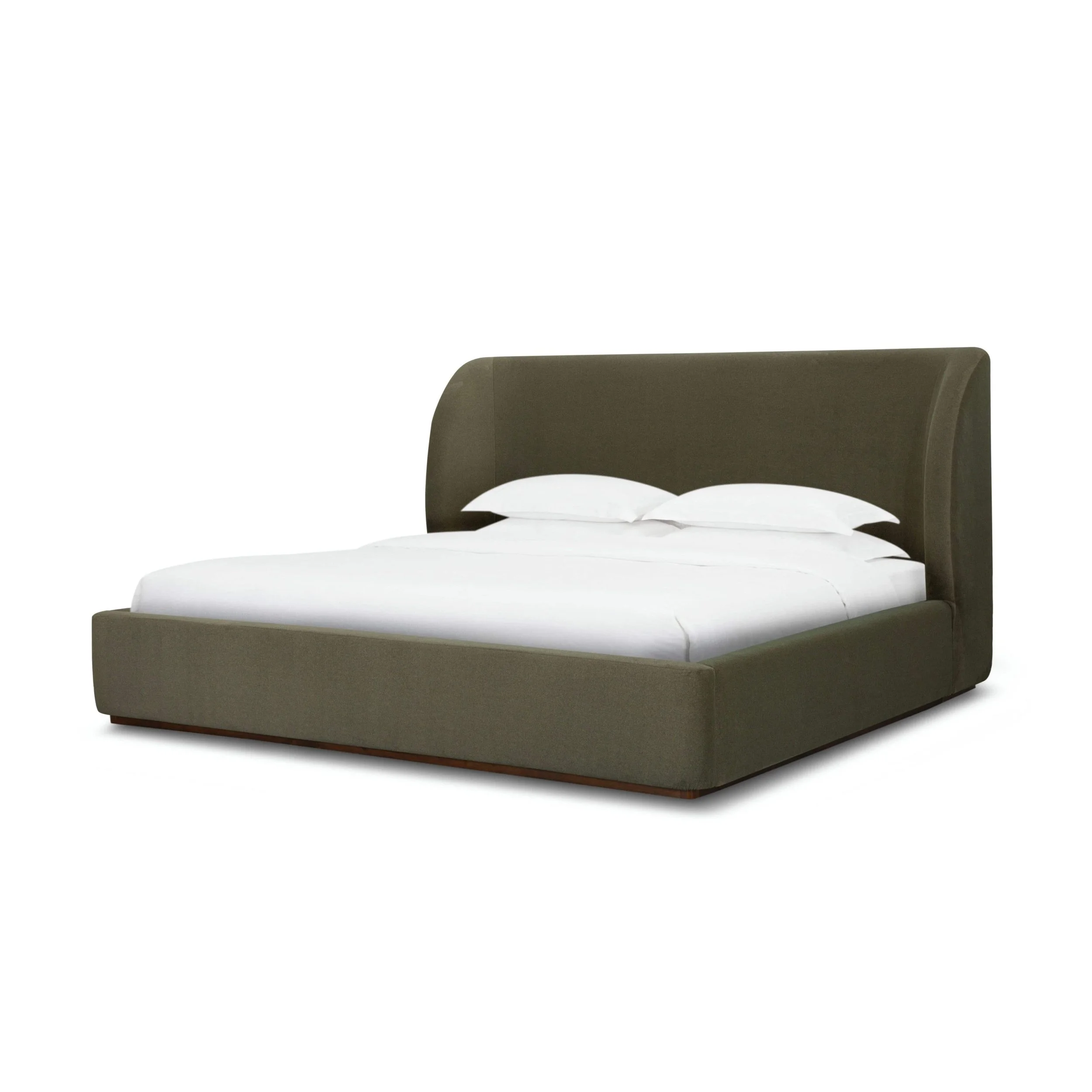 Side view of 77 king size upholstered bed with sculptural silhouette