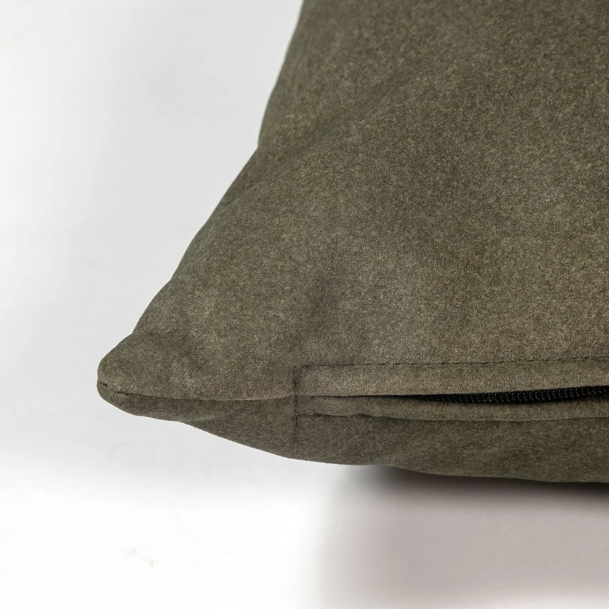 Dark-green-lumbar-pillow-seam.jpg