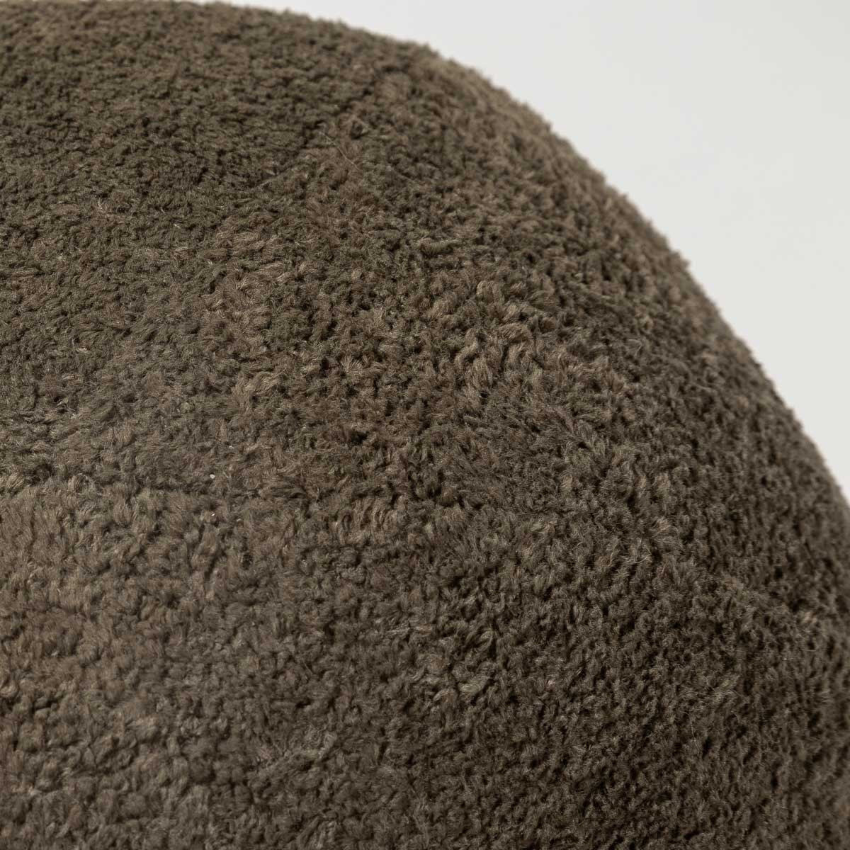 Decorative green sphere pillow styled for sofa or bed - Plush texture close up