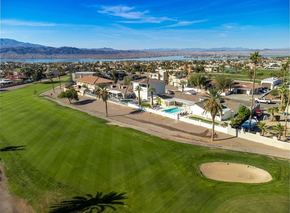 A drone shot from above shows the beauty of the golf course and mountain views. 

Add in the pool, hot tub, putting green, fire pit and hammock and it&rsquo;s the perfect property to stay and relax at! 

property: The Clubhouse 

#havasuluxstays #hav